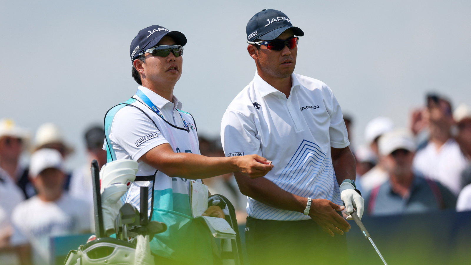 Hideki Matsuyama with caddie Shota Hayafuji