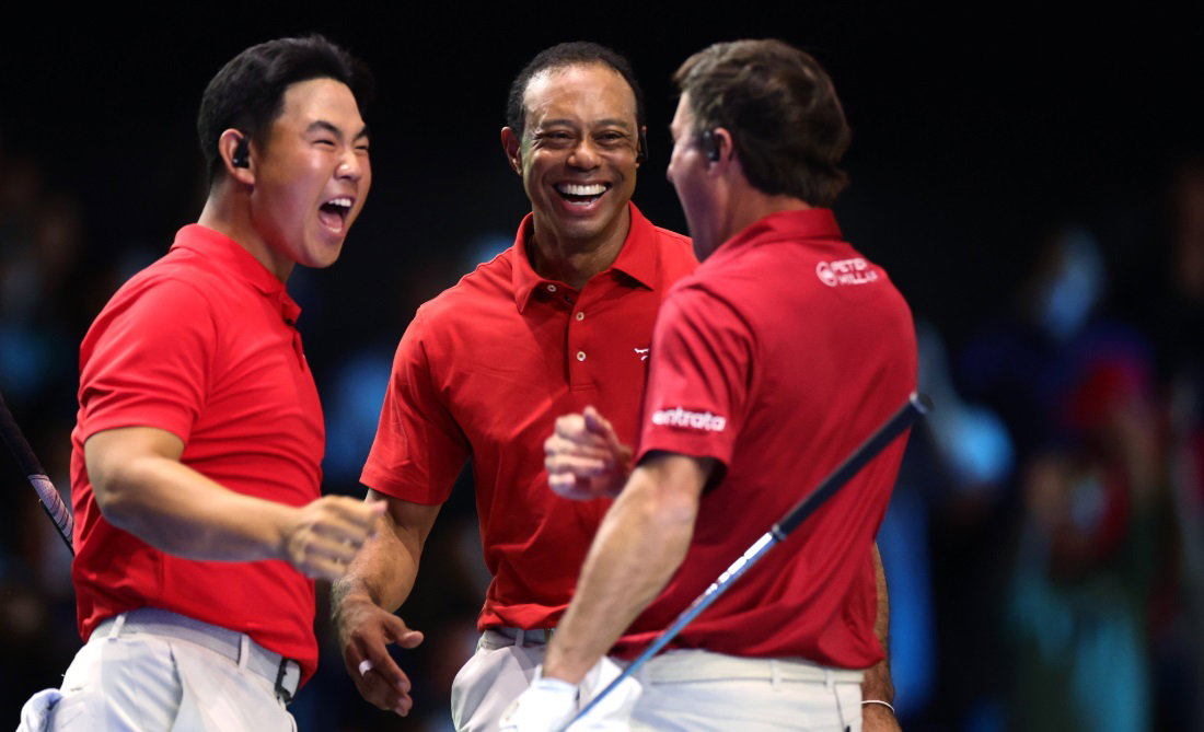 Tom Kim, Tiger Woods and Kevin Kisner celebrate a TGL victory