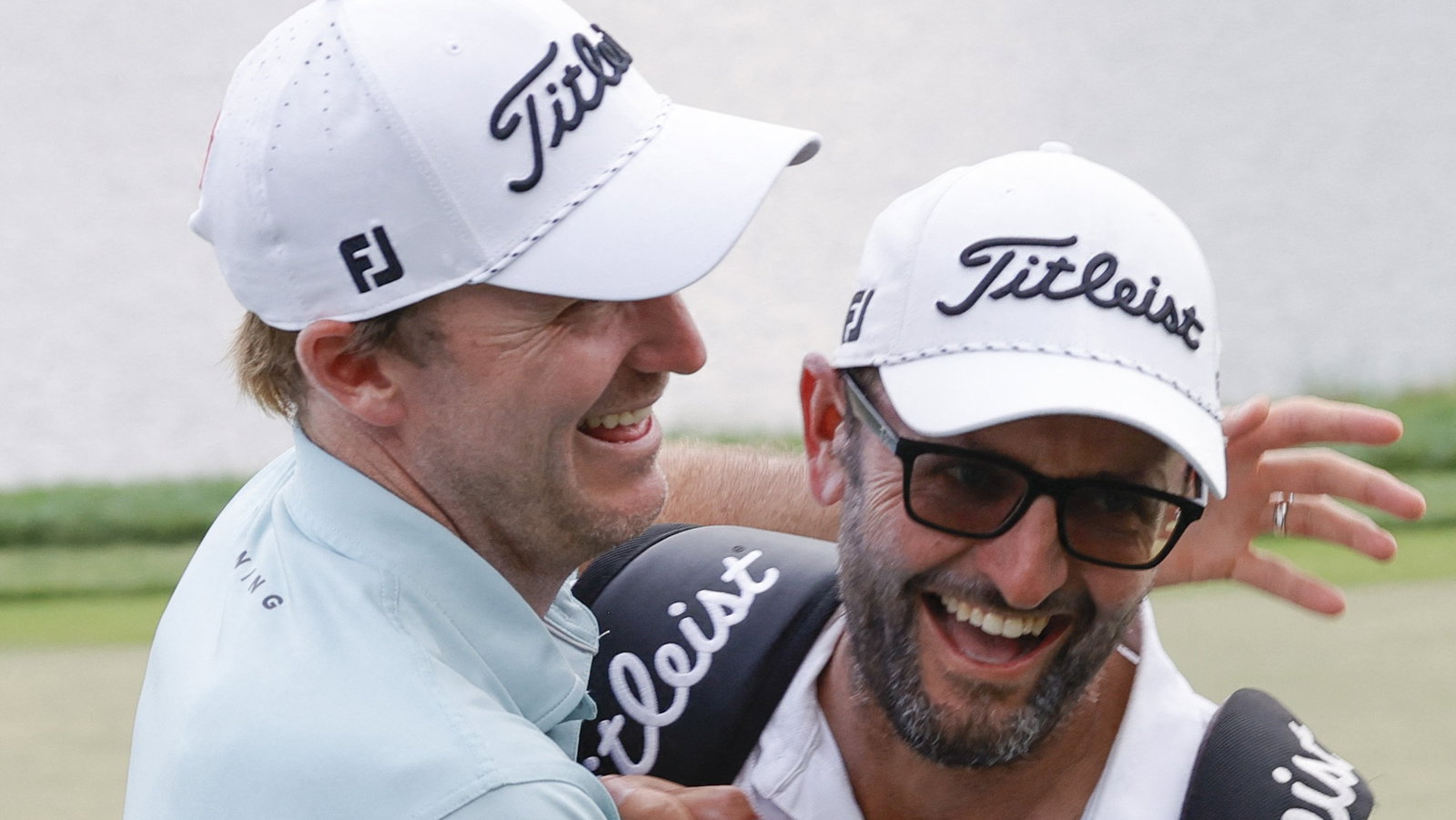 Russell Henley and his caddie