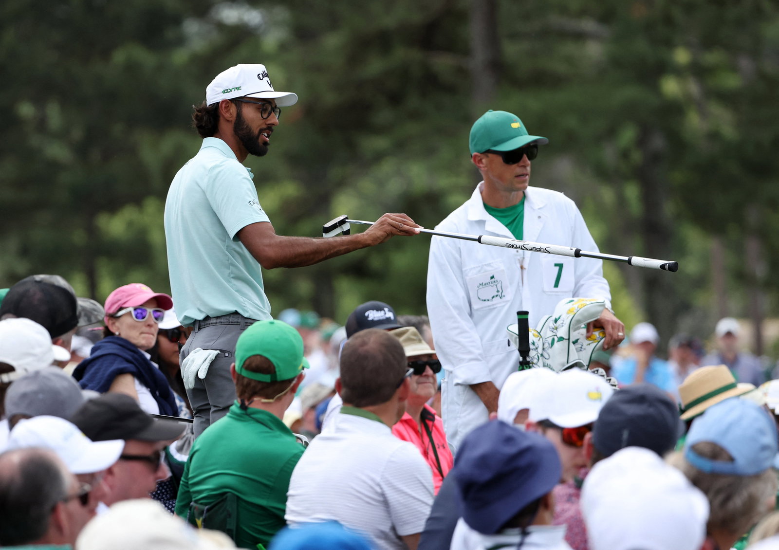 Akshay Bhatia and caddie John Limanti