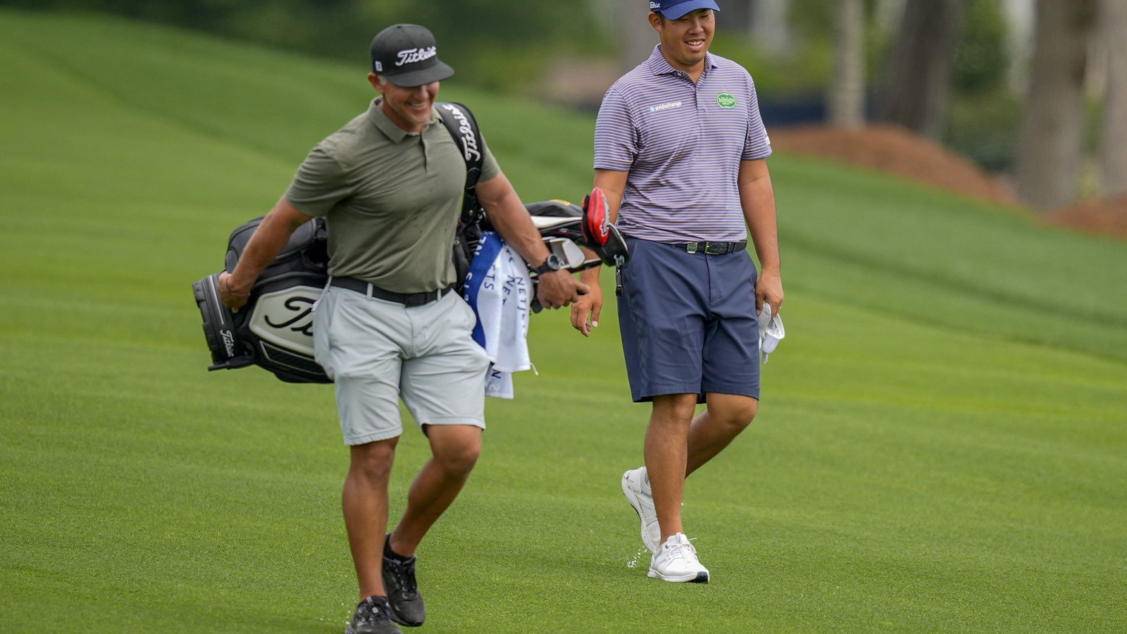 Byeong Hun An and his caddie