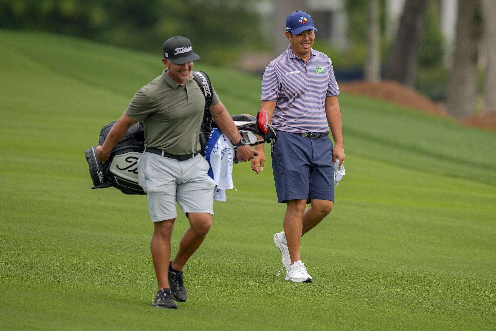 Byeong Hun An and his caddie