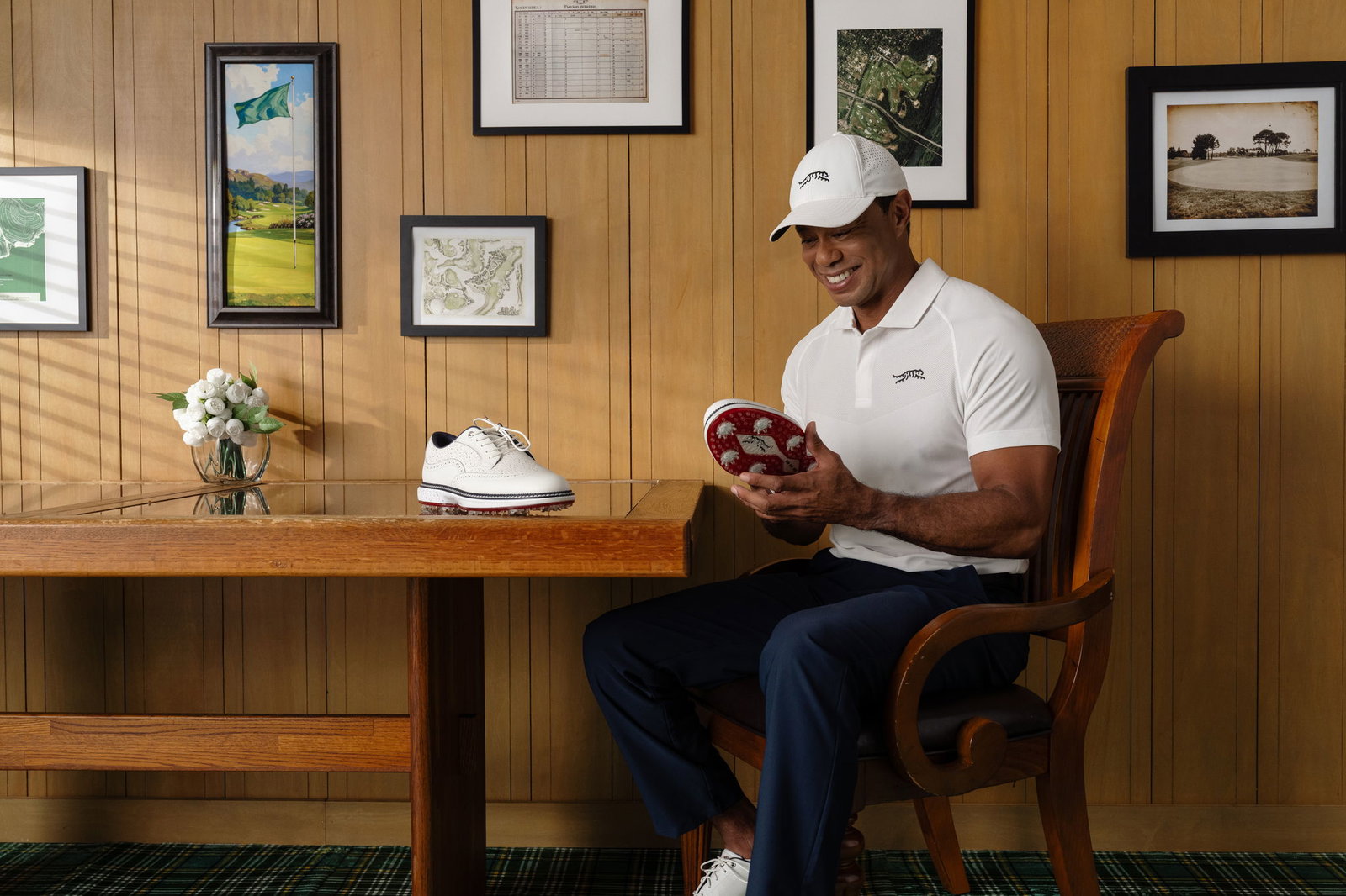 Woods checks out the new shoes 