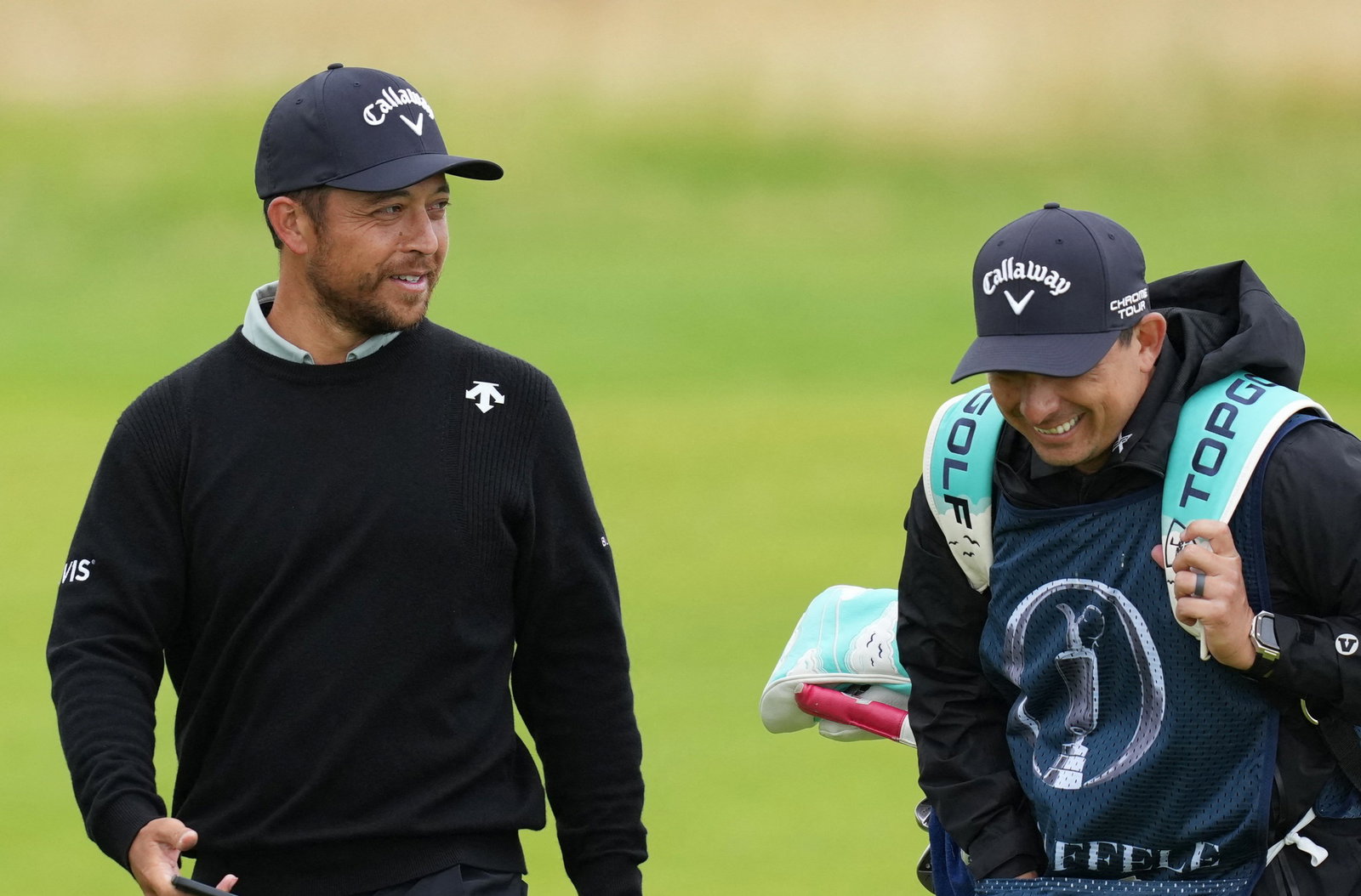 Xander Schauffele and his caddie