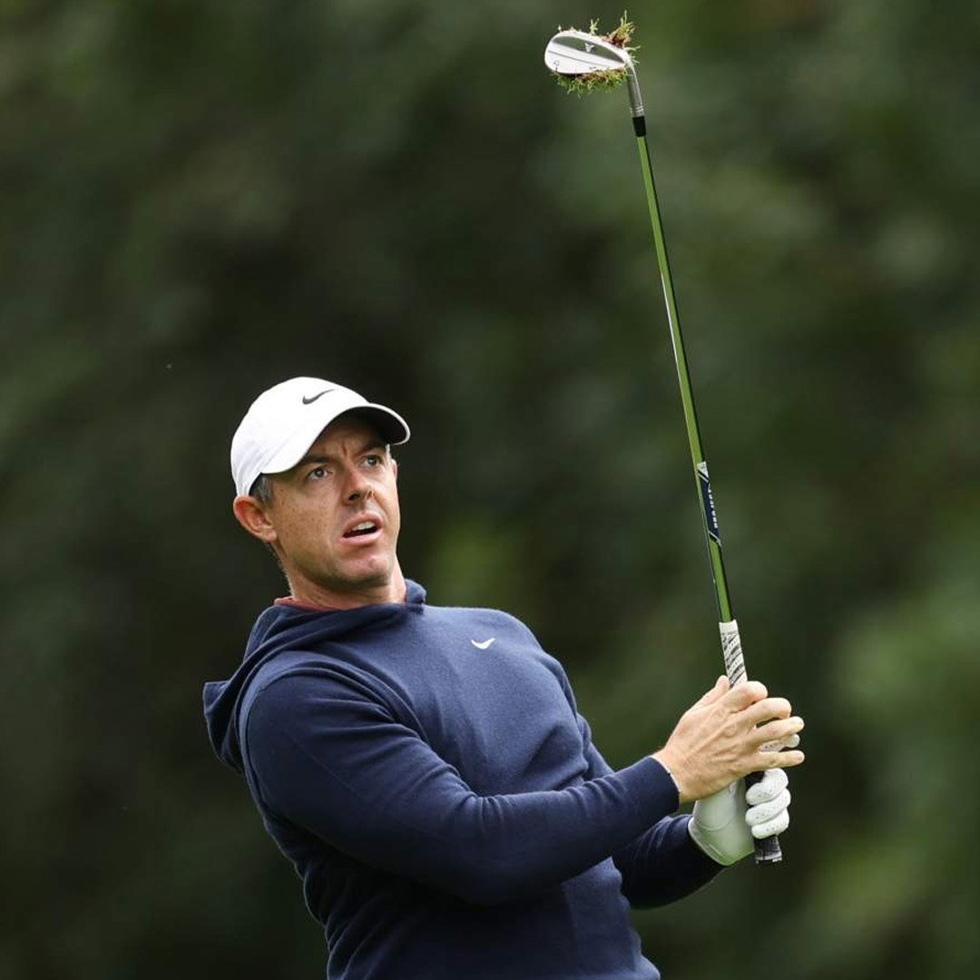 McIlroy plays a shot with his new TaylorMade MG5 wedges