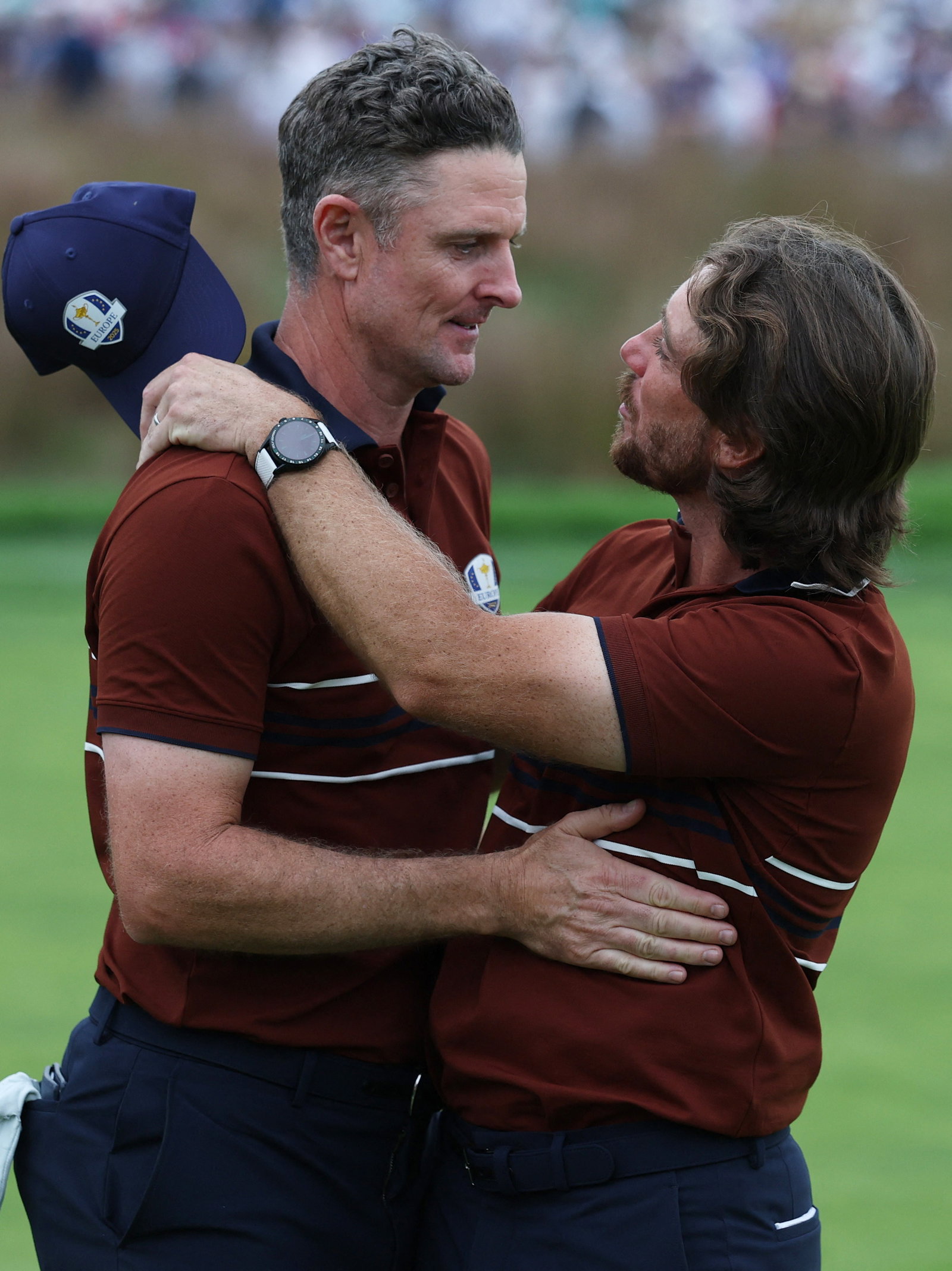Justin Rose embraces Tommy Fleetwood at the Ryder Cup