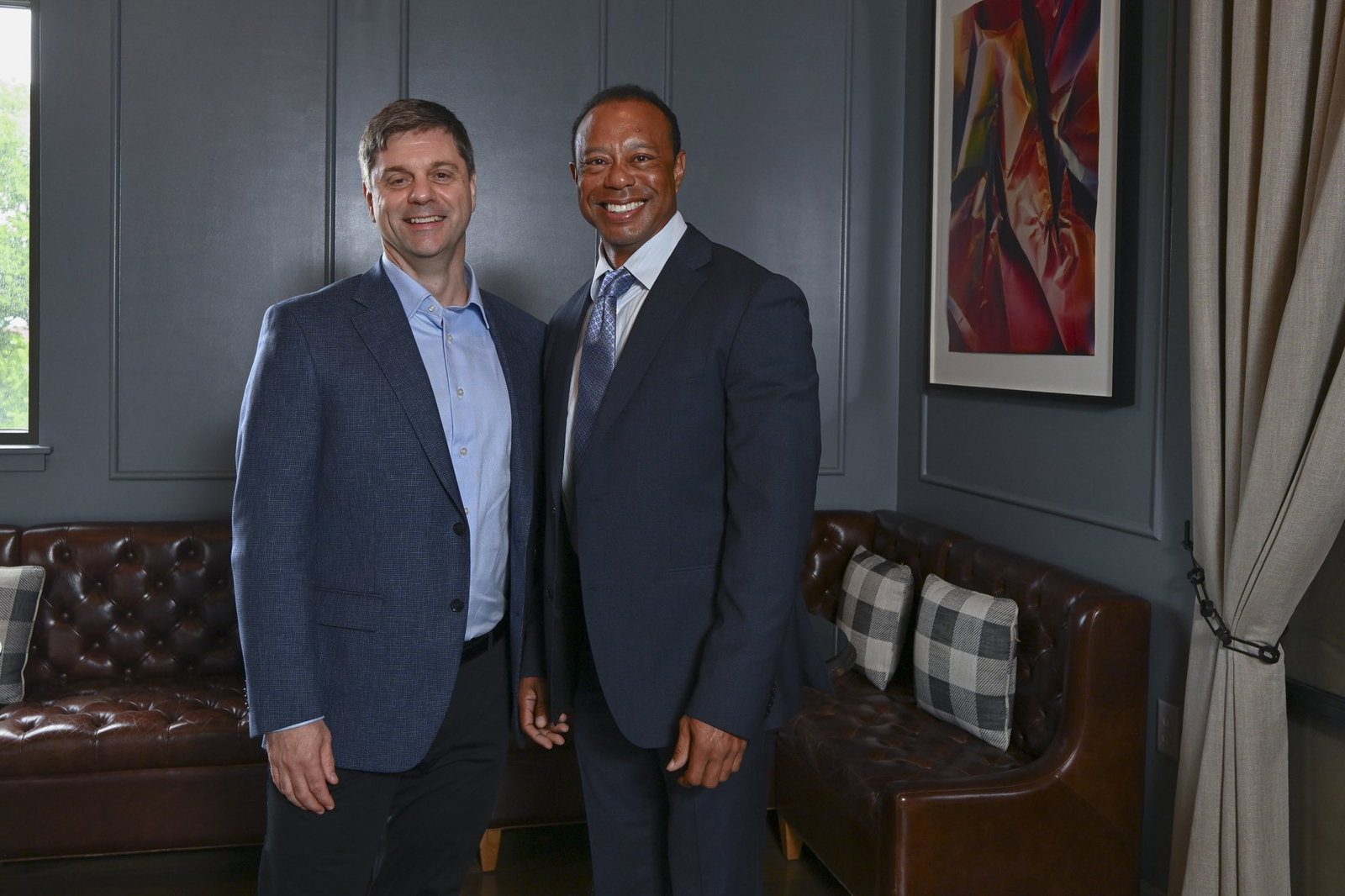 Brian Rolapp and Tiger Woods