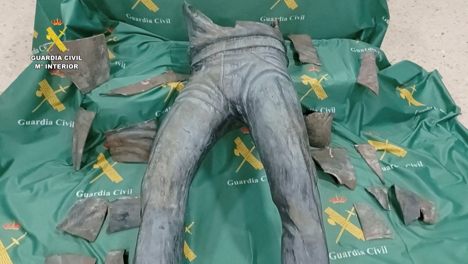 A screengrab from a handout video shows pieces of a statue of Seve Ballesteros