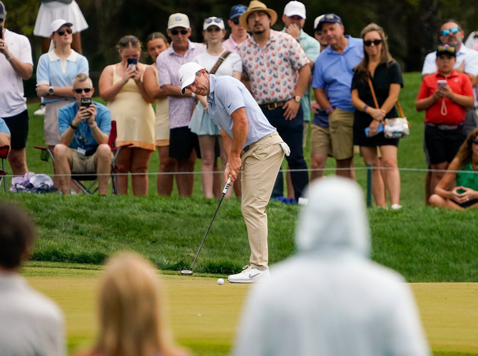 McIlroy putts out on the 15th at Sawgrass
