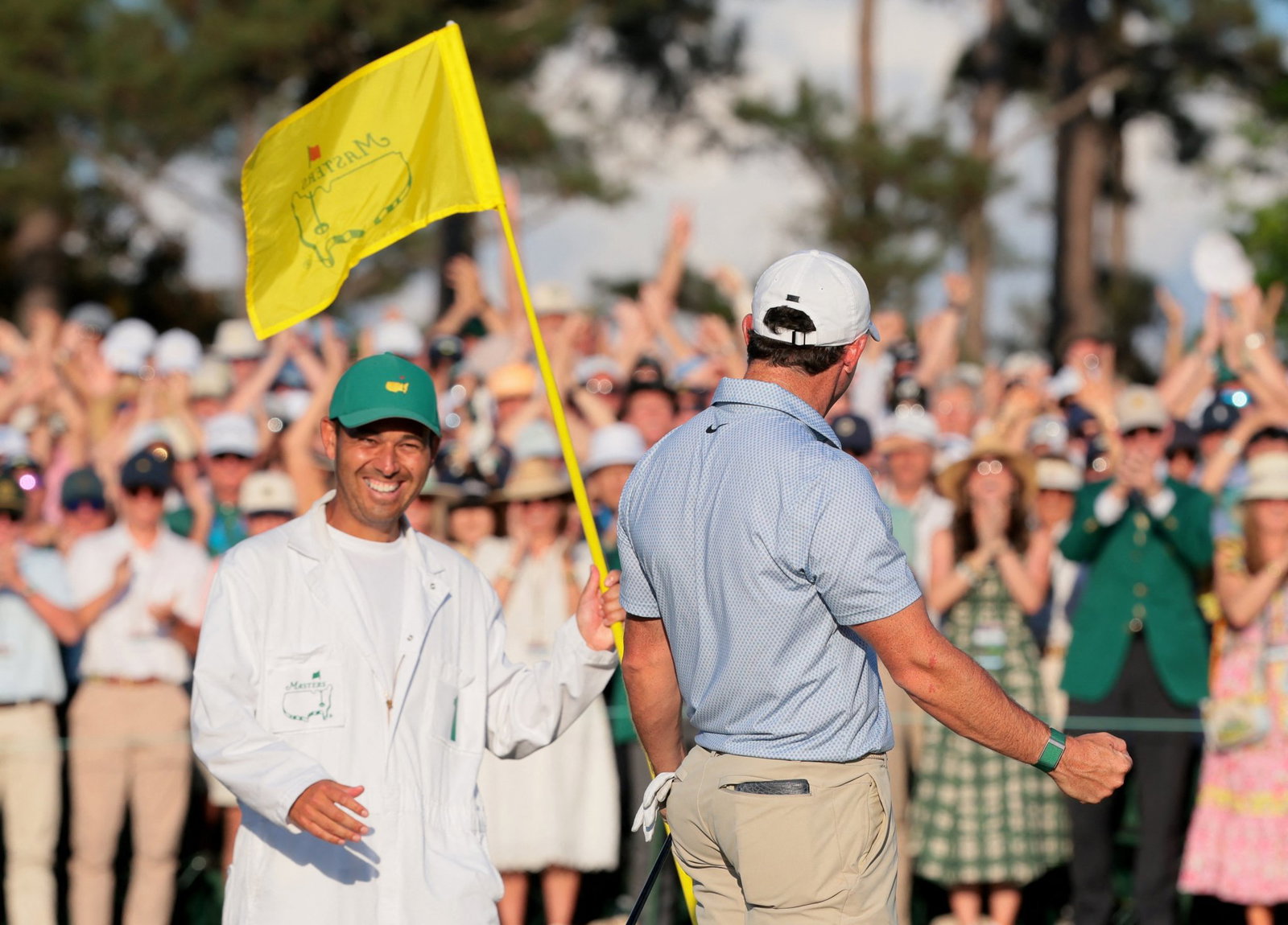 Diamond and McIlroy celebrate on the 18th