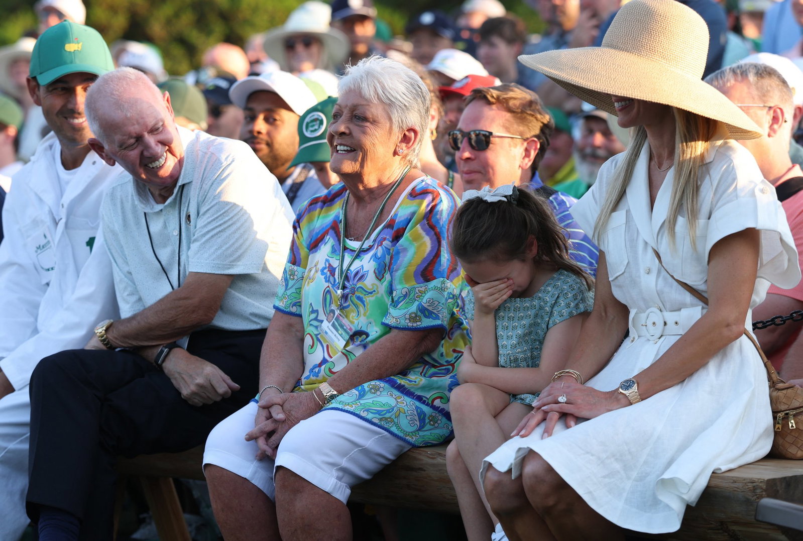 McIlroy's parents, daughter Poppy and wife Erica