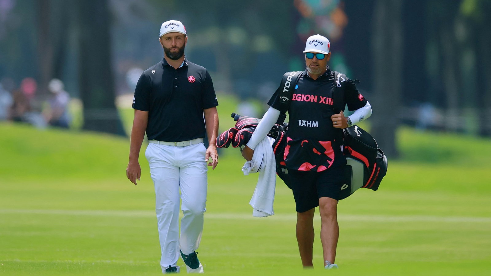 Jon Rahm and Adam Hayes