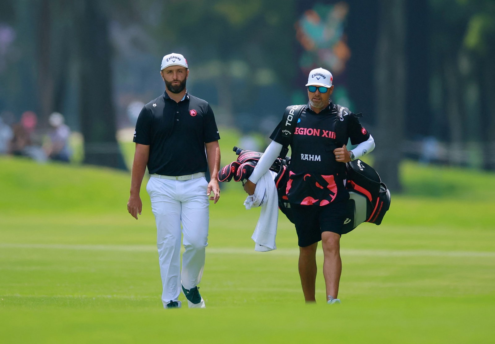 Jon Rahm and Adam Hayes