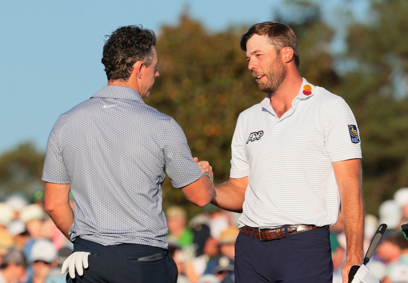 McIlroy and Burns shake hands on 18