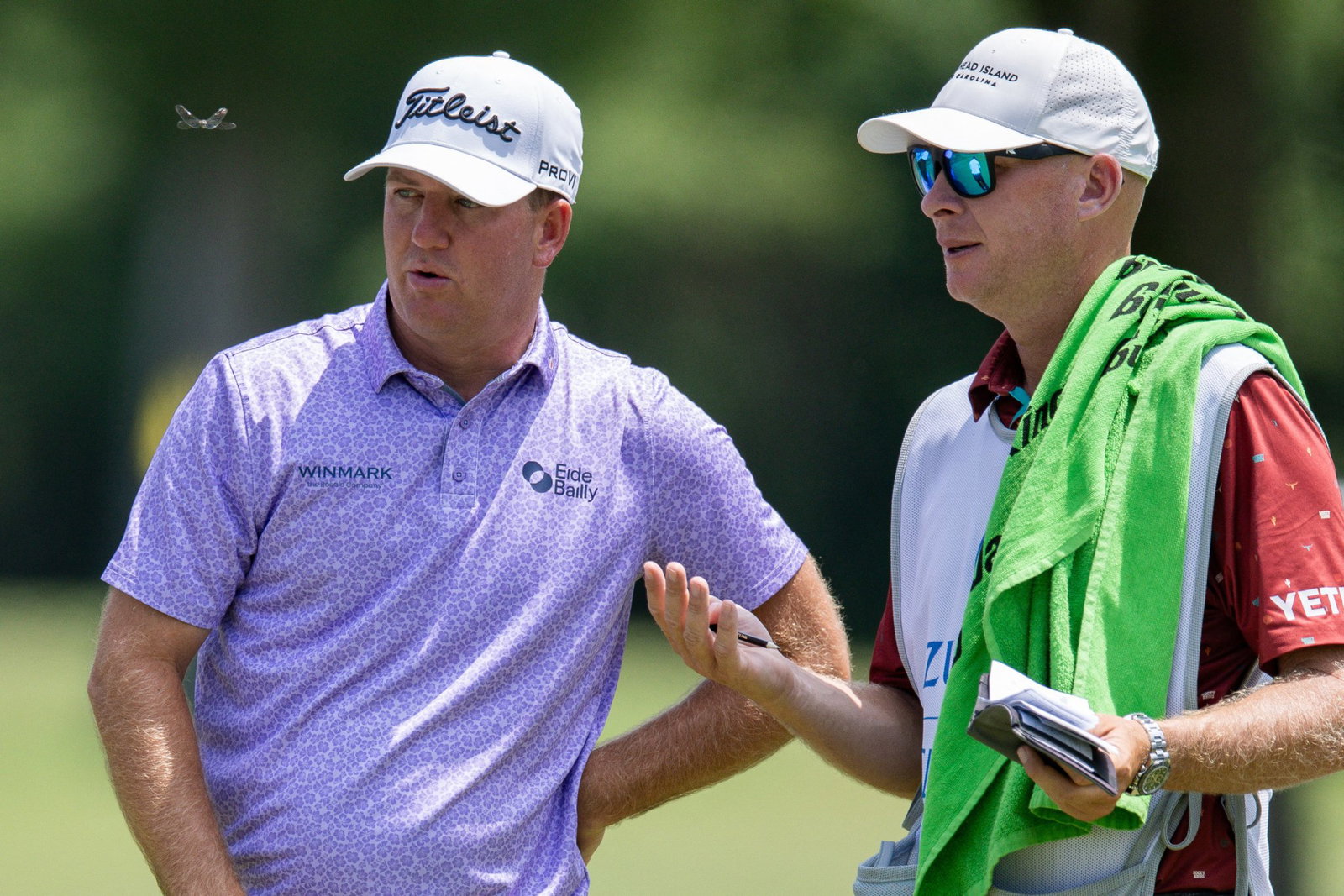 Tom Hoge with his caddie Christian Baech
