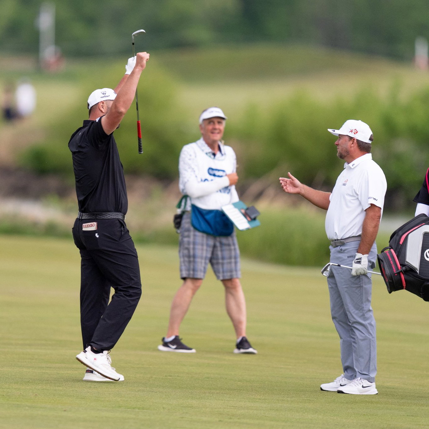 Rahm reacts to a rare albatross on 17