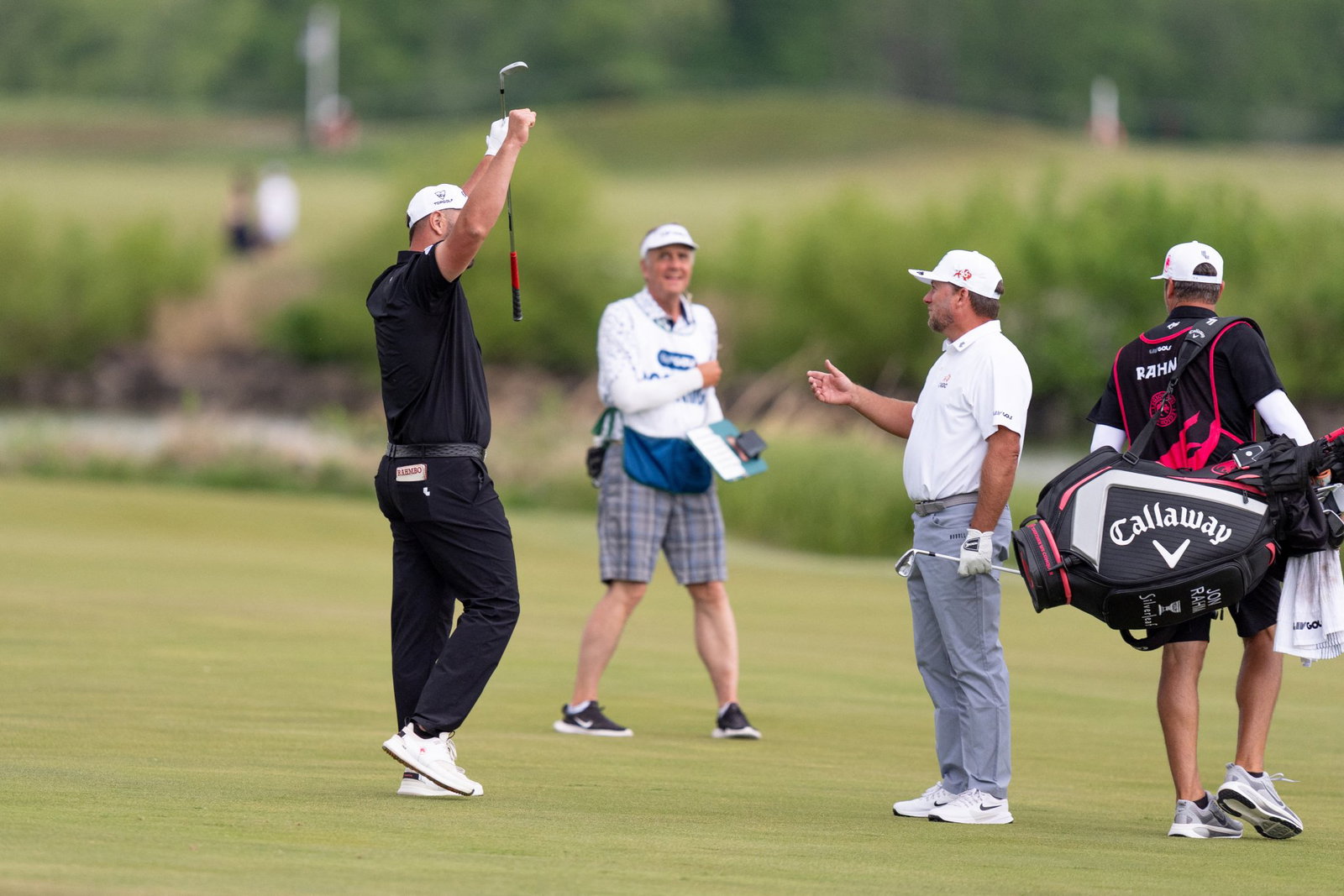Rahm reacts to a rare albatross on 17
