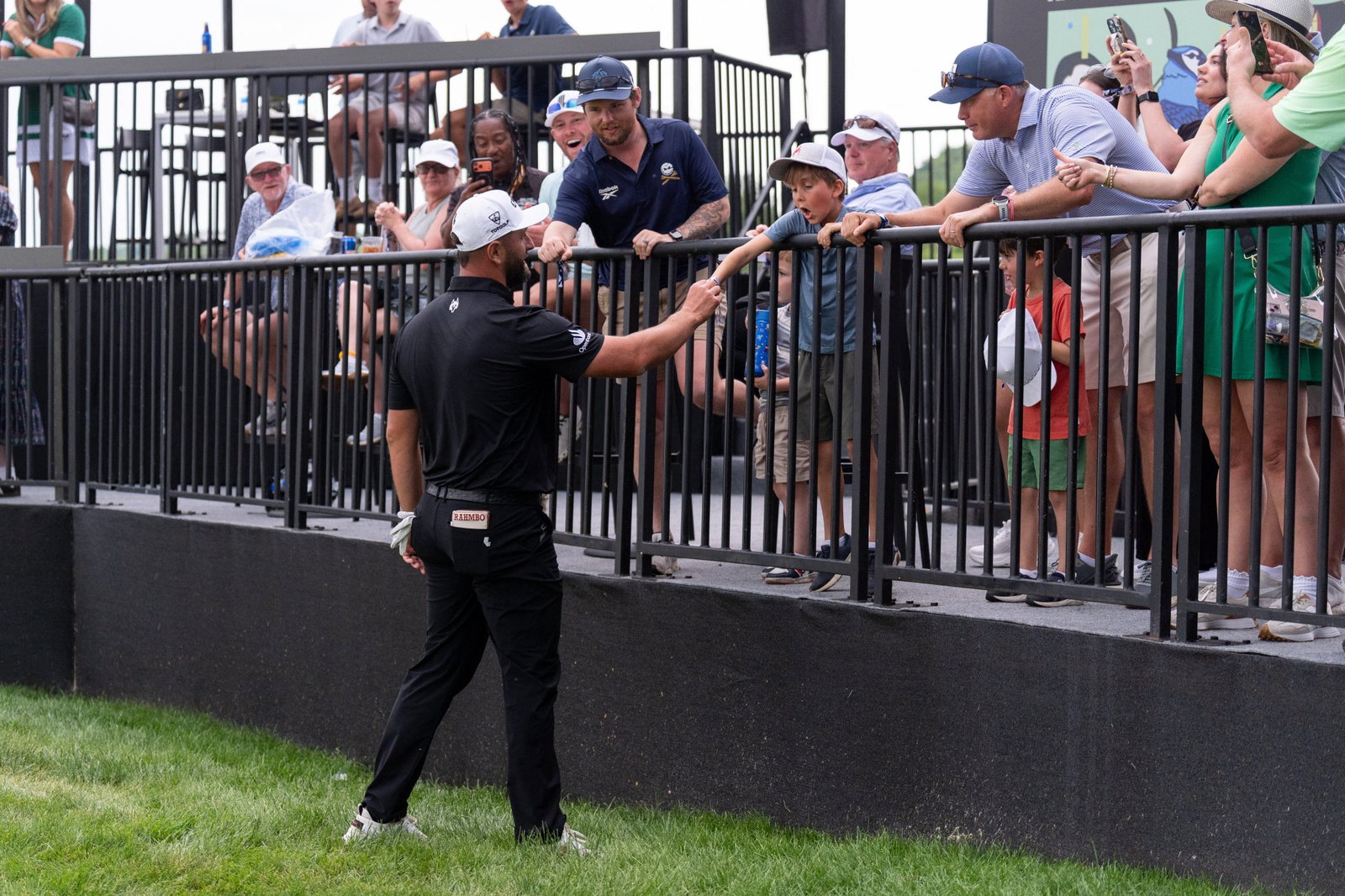 Jon Rahm signs autographs at LIV Golf's event in Virginia