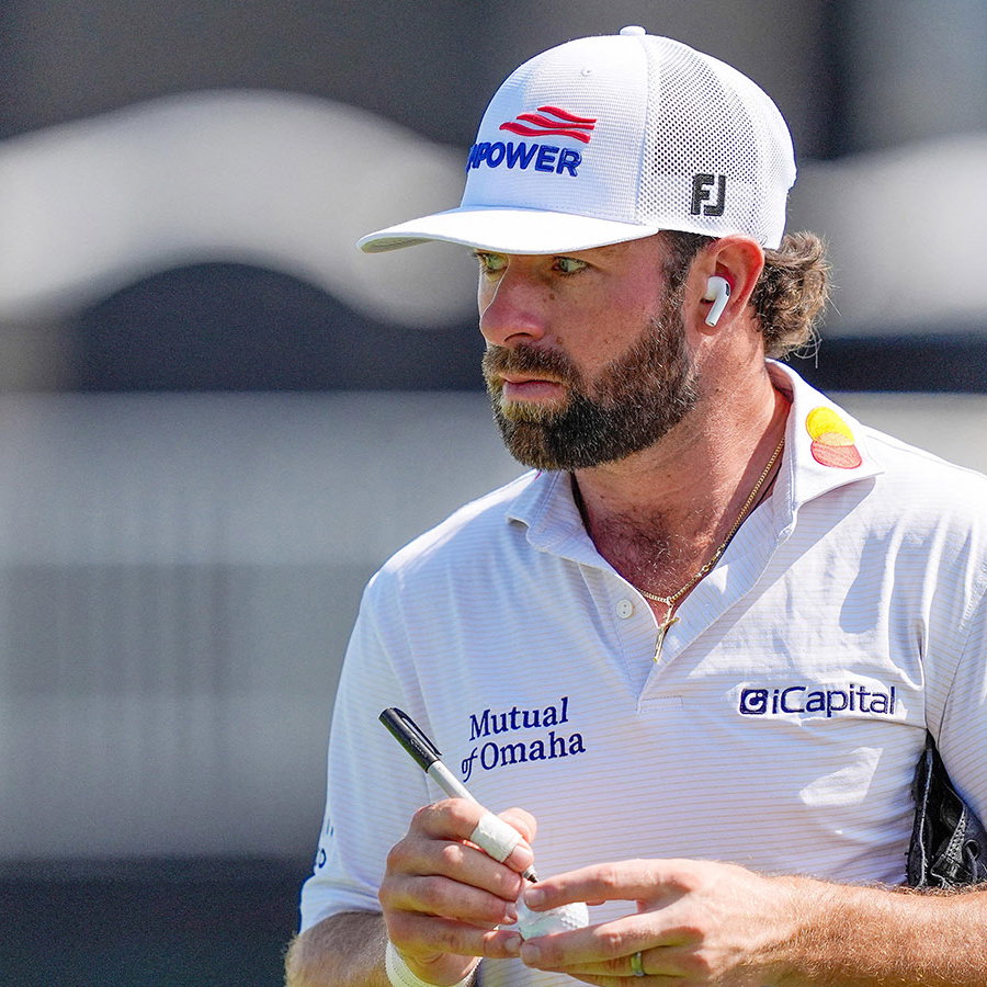 Cameron Young marks his ball before the first round of the Cadillac Championship. Image: Reuters
