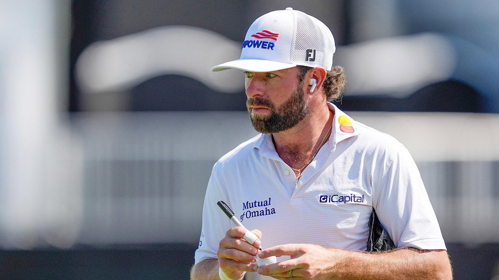 Cameron Young marks his ball before the first round of the Cadillac Championship. Image: Reuters