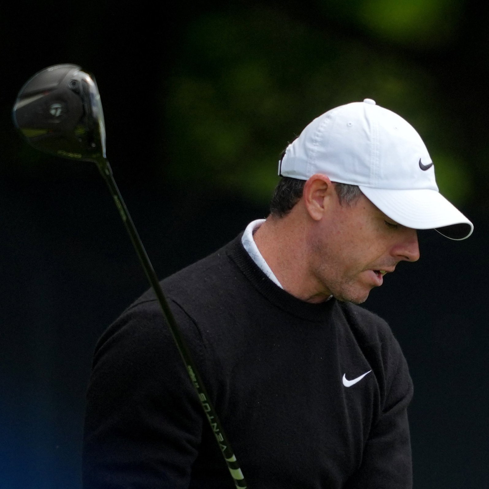 Rory McIlroy reacts angrily on the fourth tee 