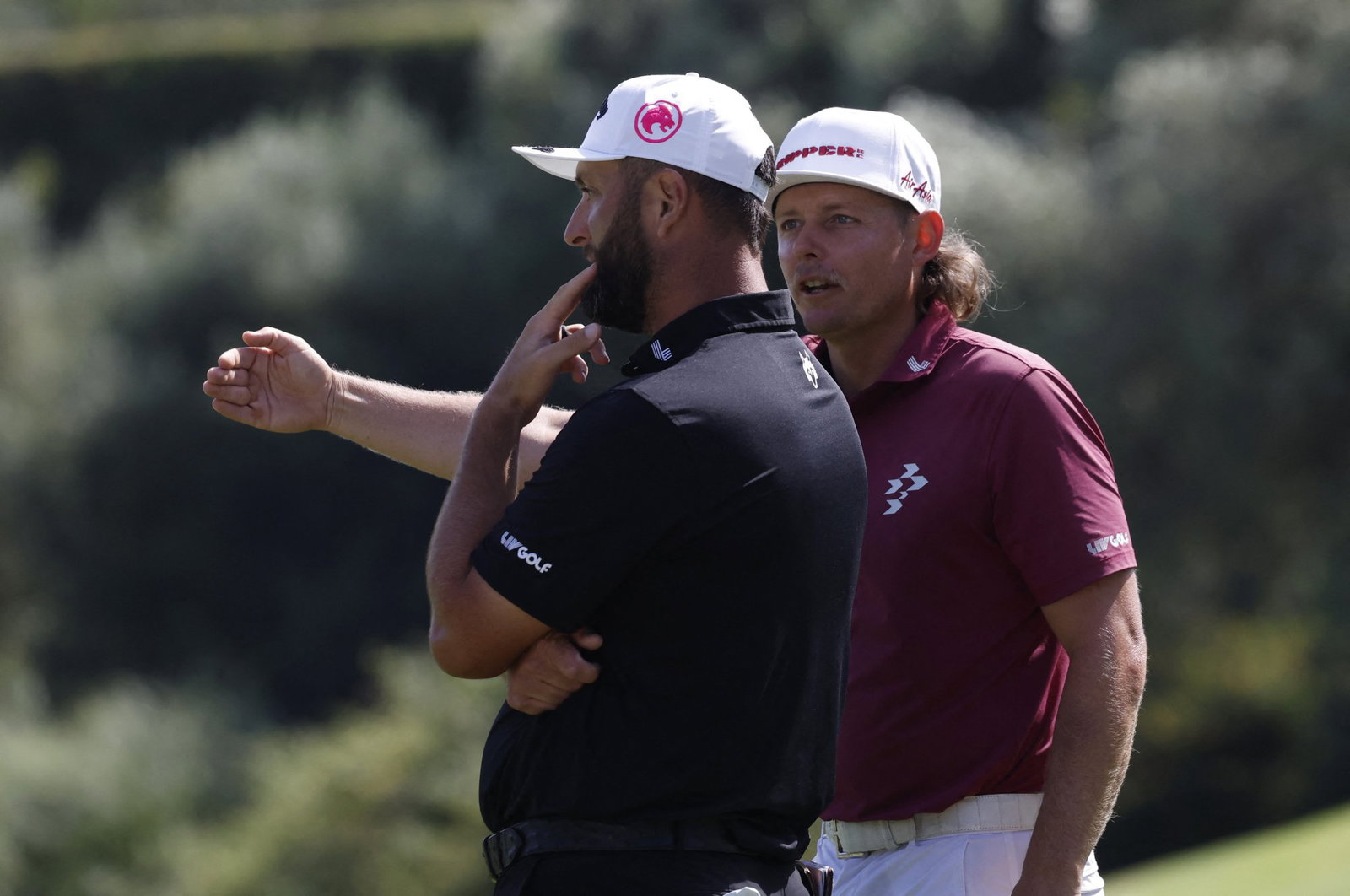 Jon Rahm and Cameron Smith