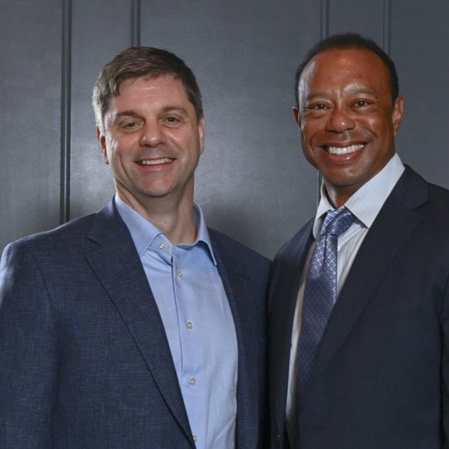 Brian Rolapp and Tiger Woods