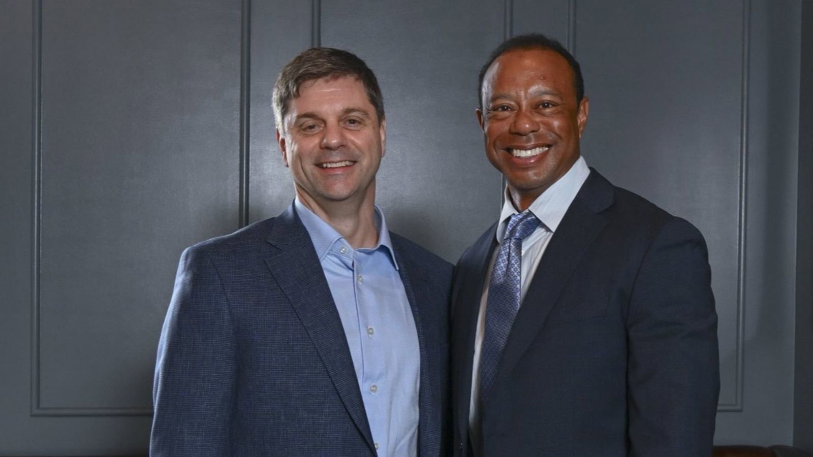Brian Rolapp and Tiger Woods