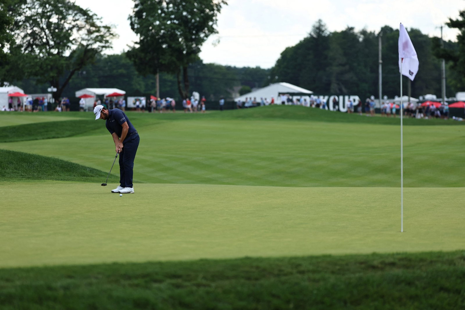 Patrick Cantlay hits a putt during the final round of the Travelers Championship