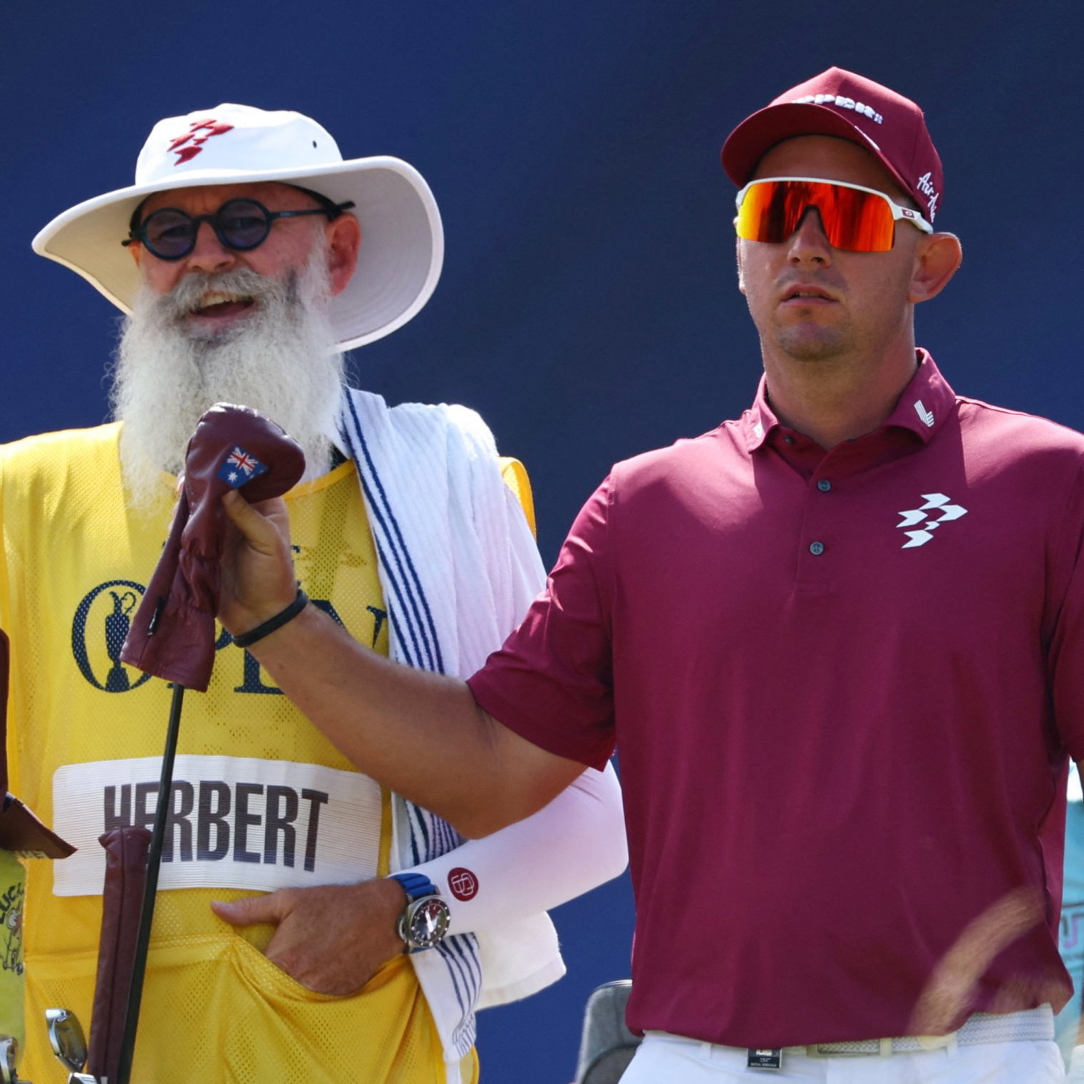Lucas Herbert and his caddie
