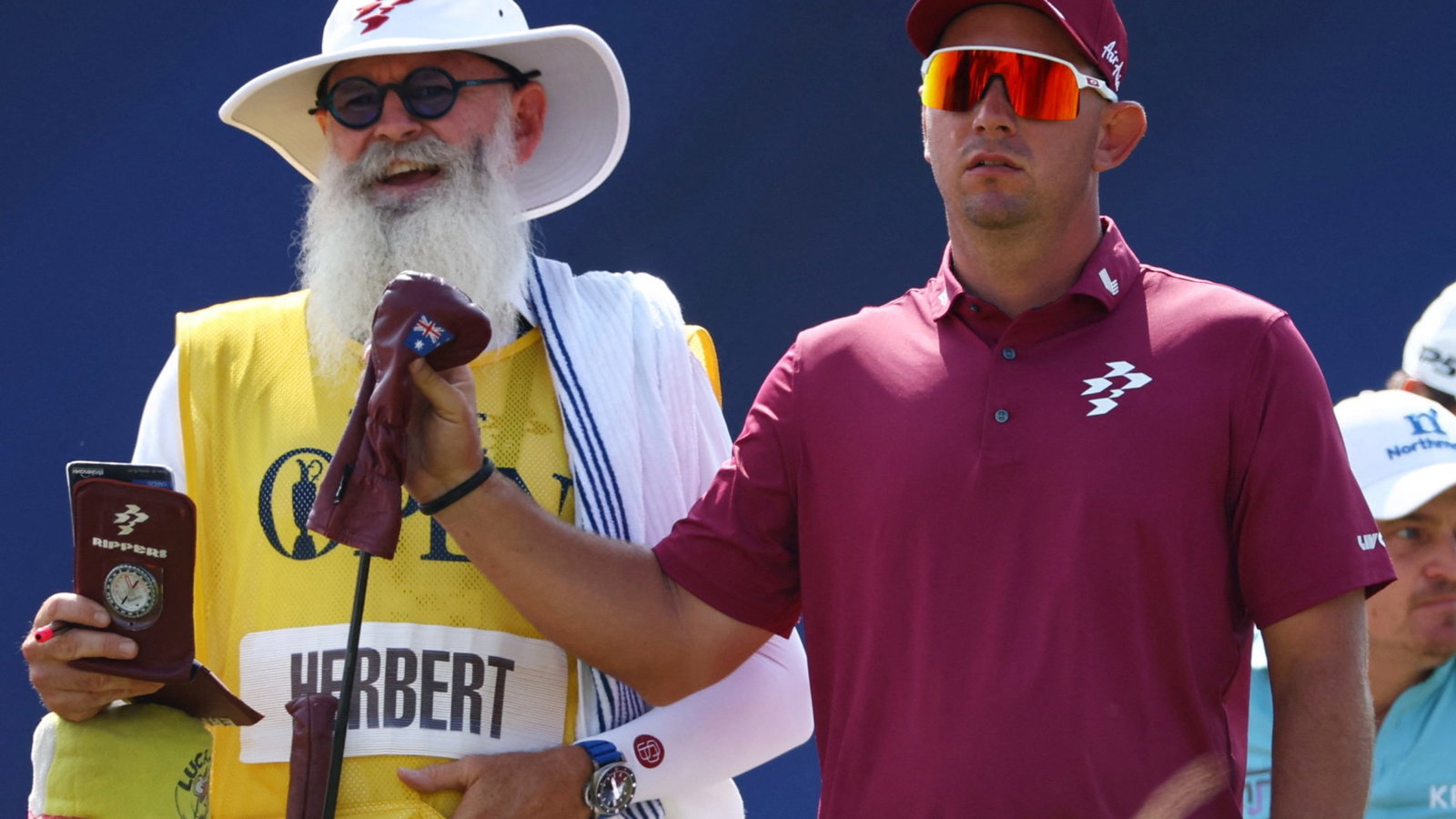 Lucas Herbert and his caddie