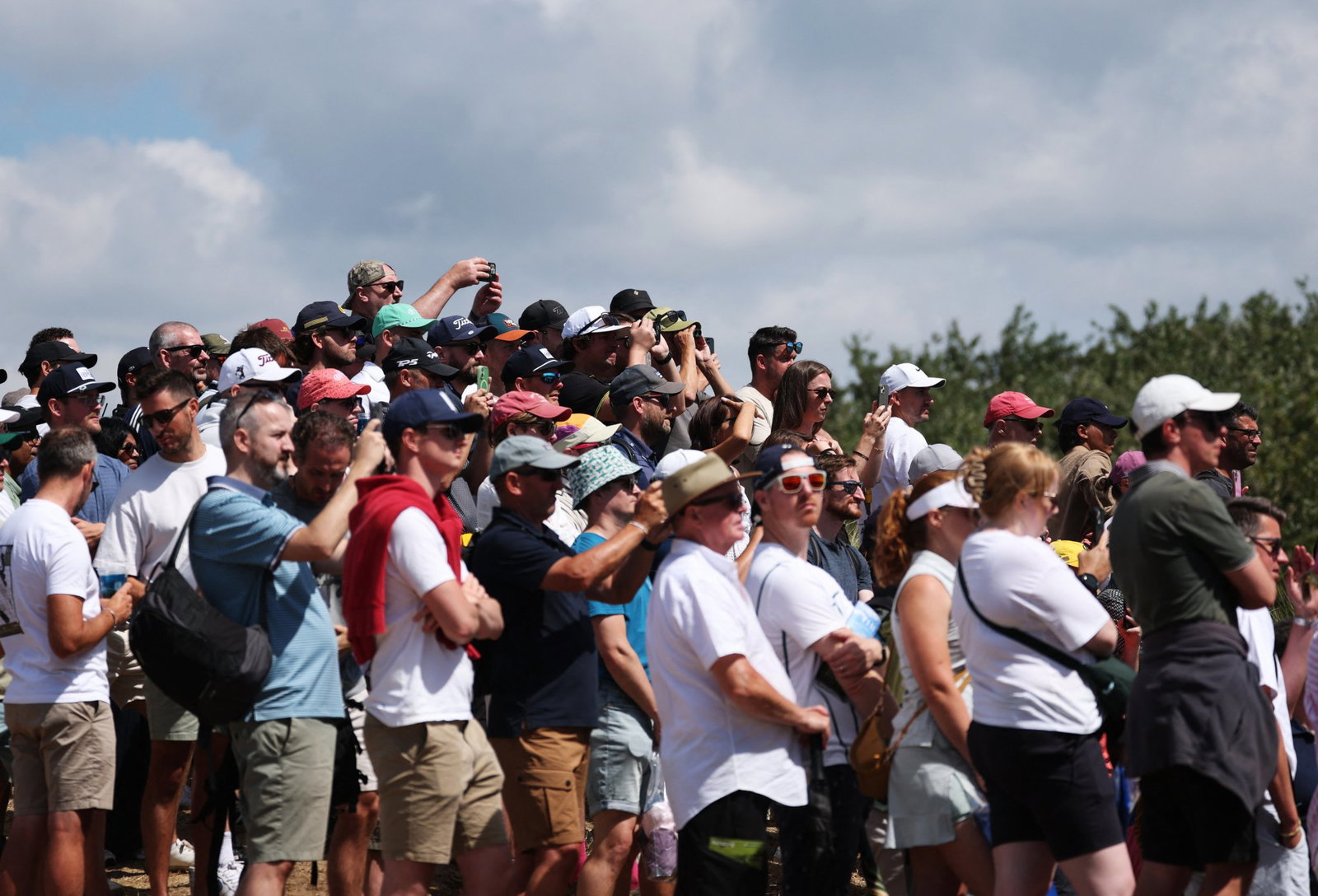 Spectators following Rory McIlroy