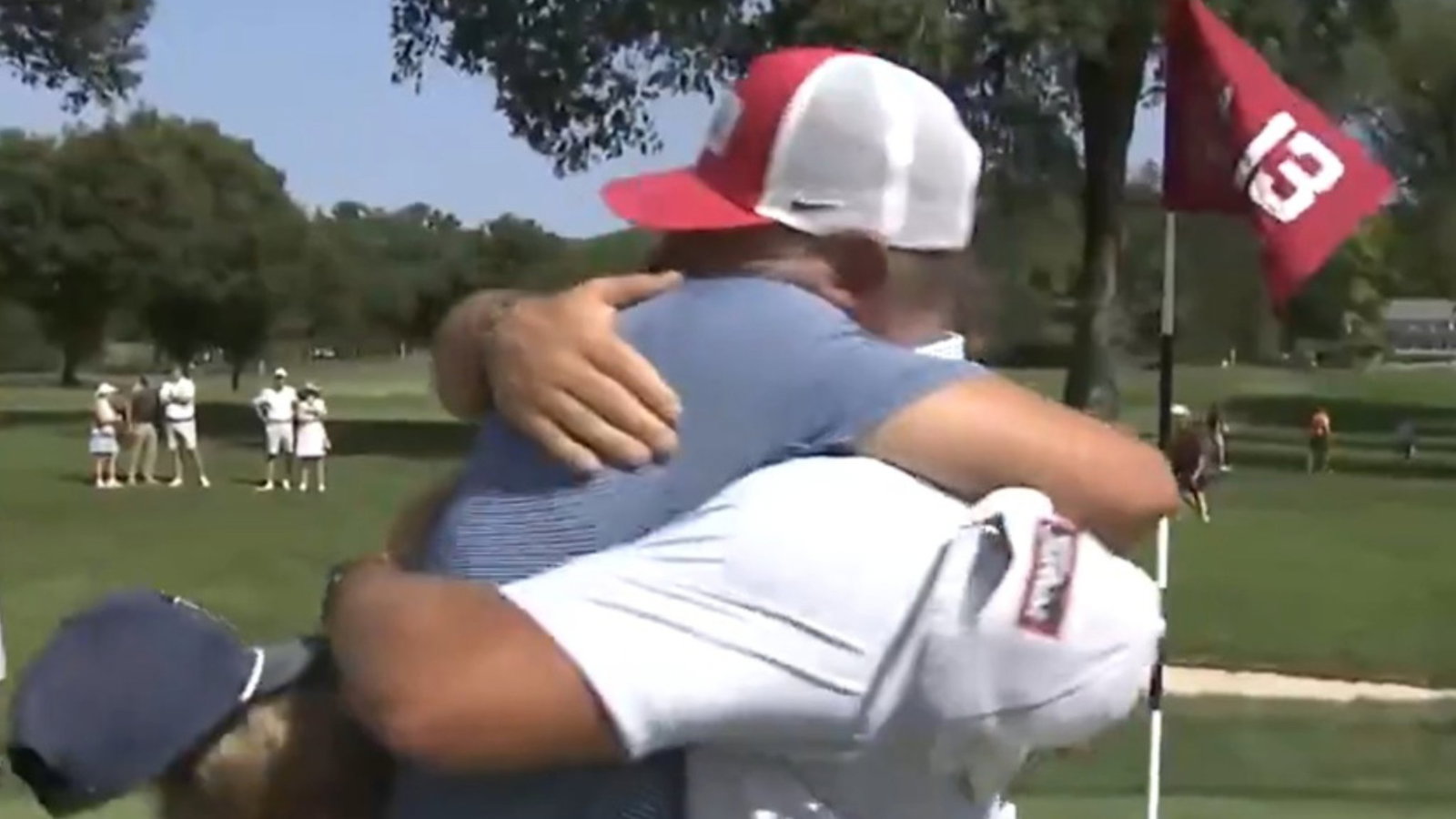Noah Maclauchlan celebrates with his family on 18