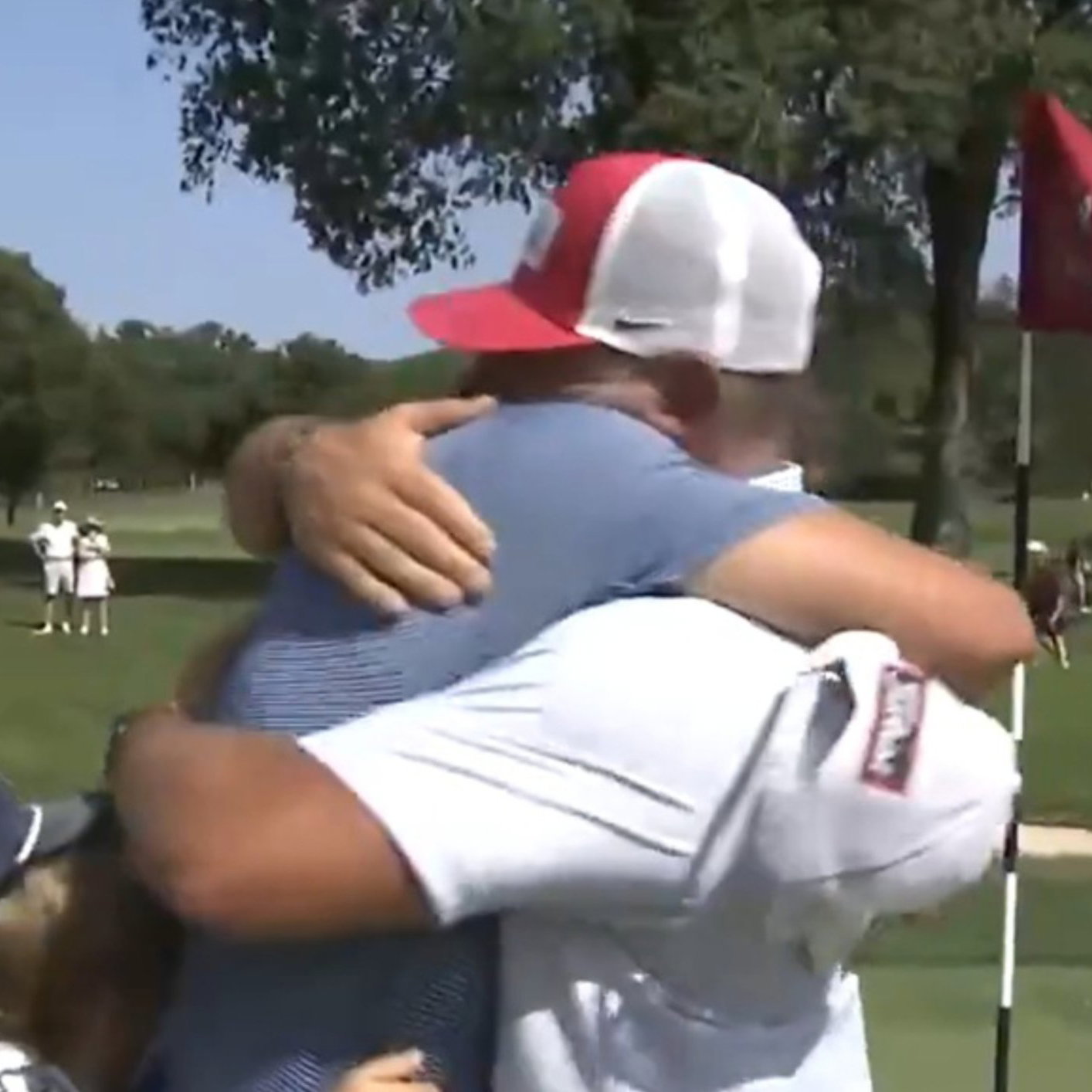 Noah Maclauchlan celebrates with his family on 18