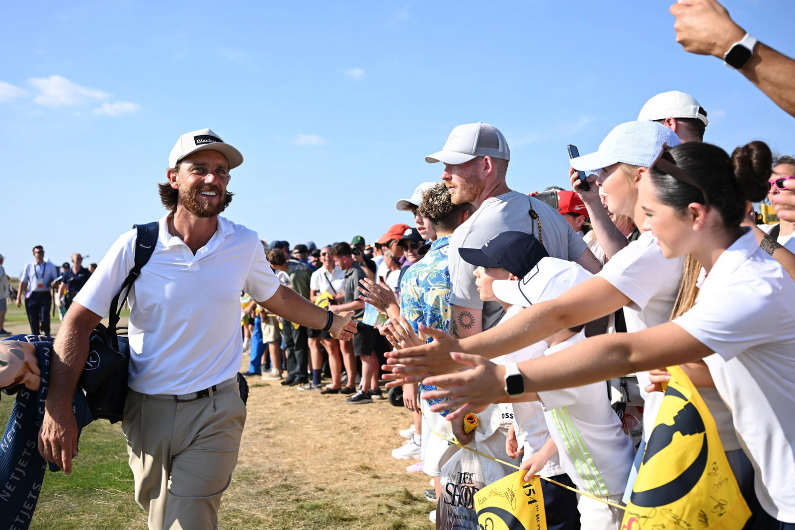 Tommy Fleetwood with fans at the 154th Open. Courtesy The R&A.