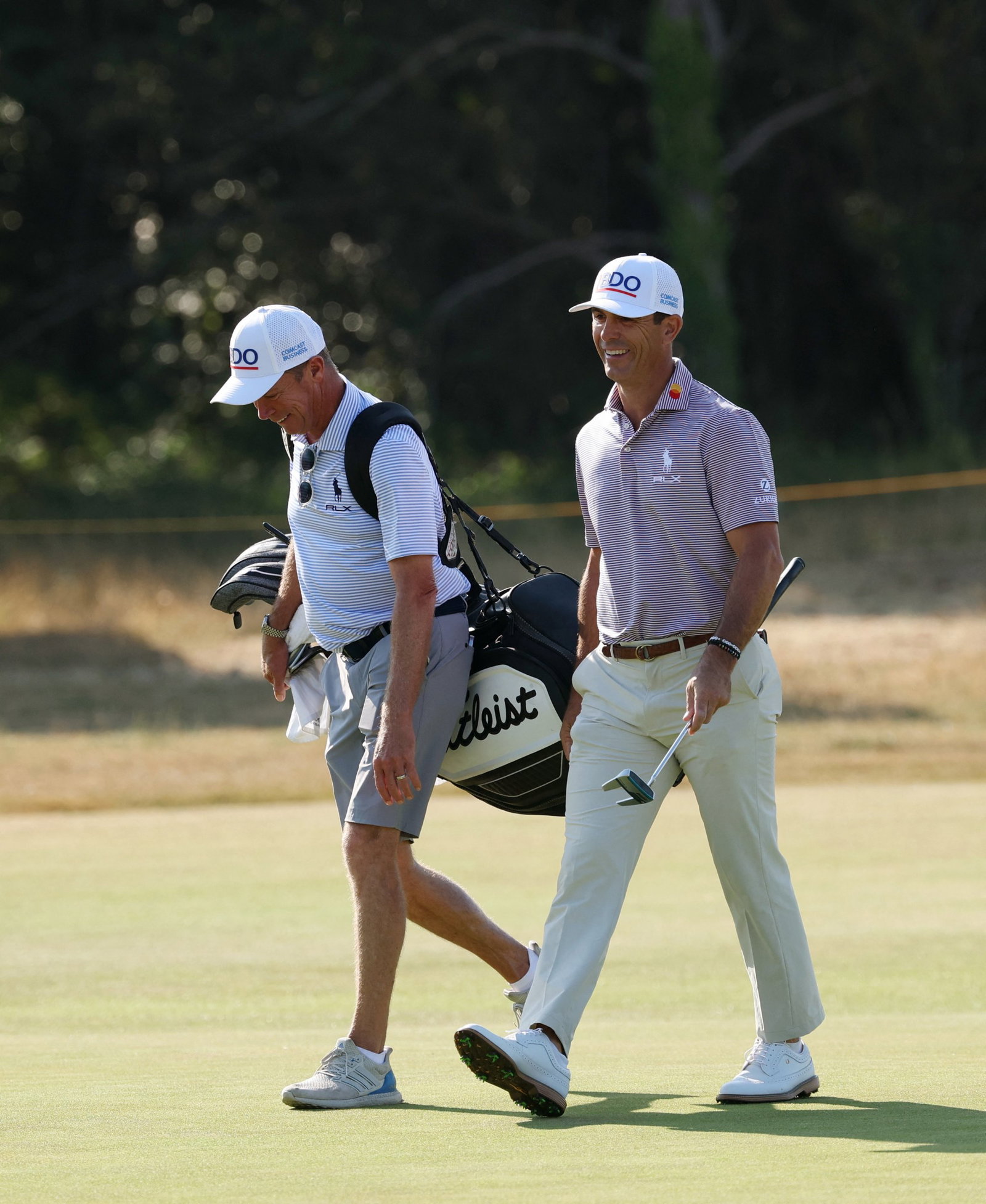 Horschel with caddie Lord