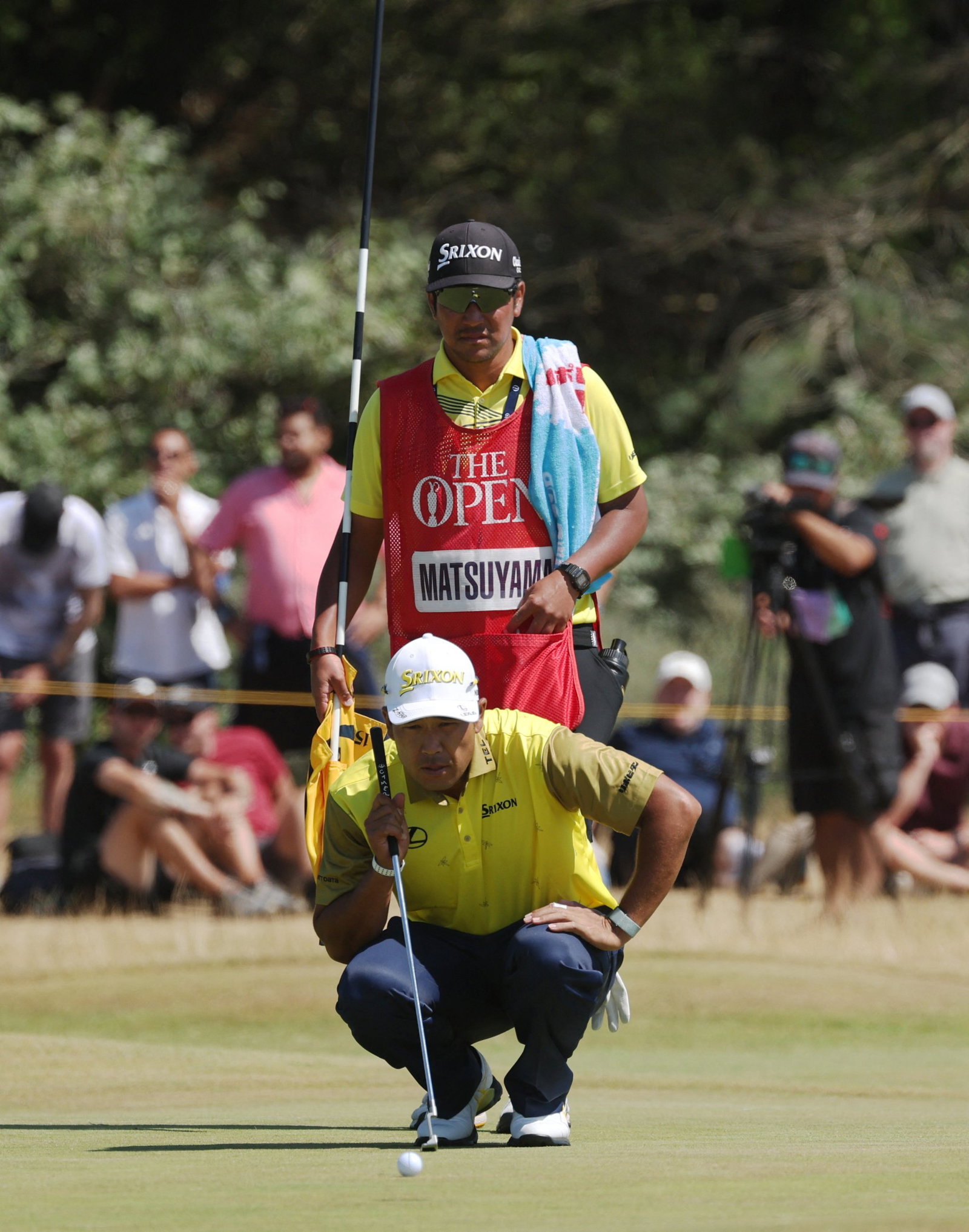 Matsuyama with caddie Tabuchi 