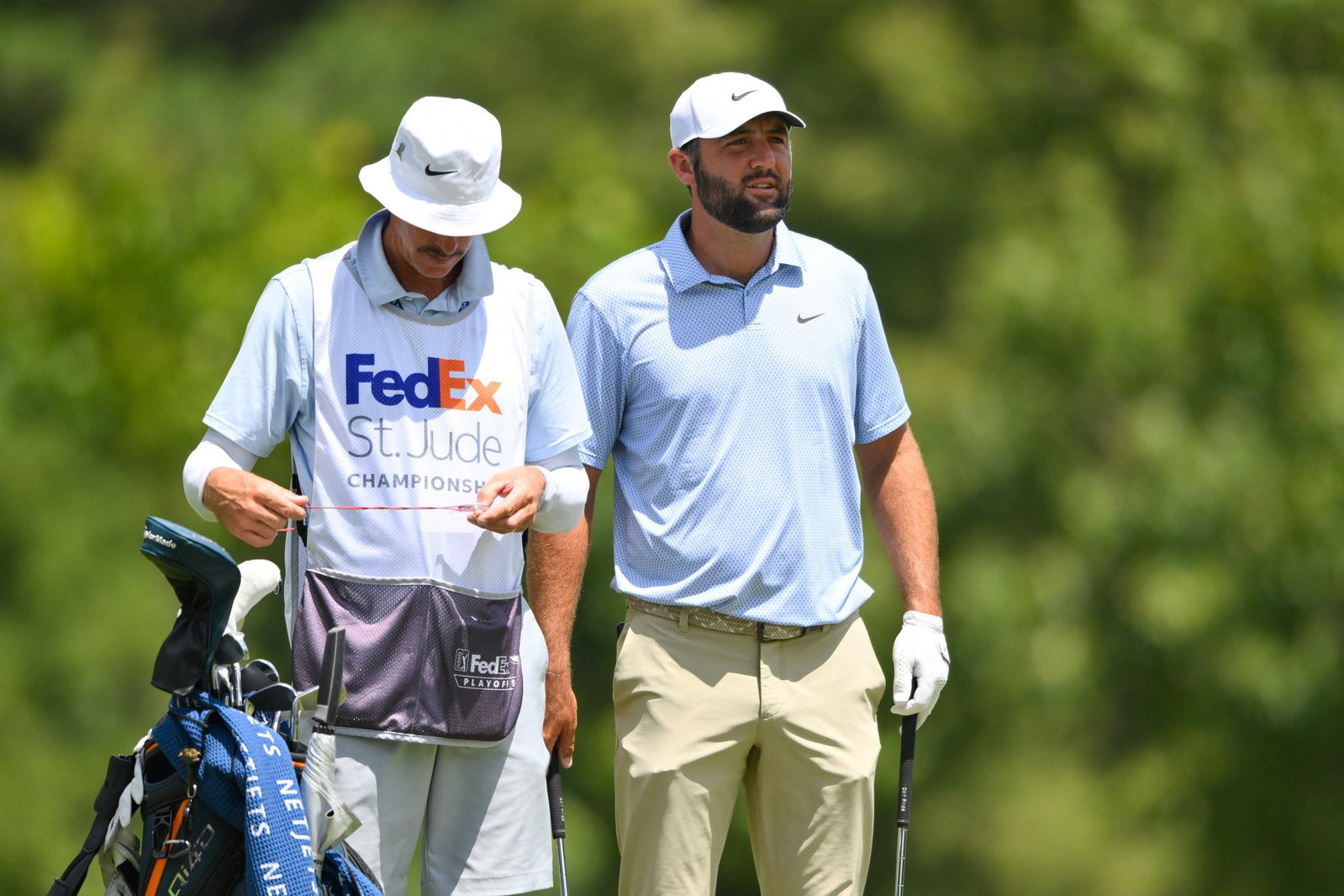 Scheffler with caddie Ted Scott