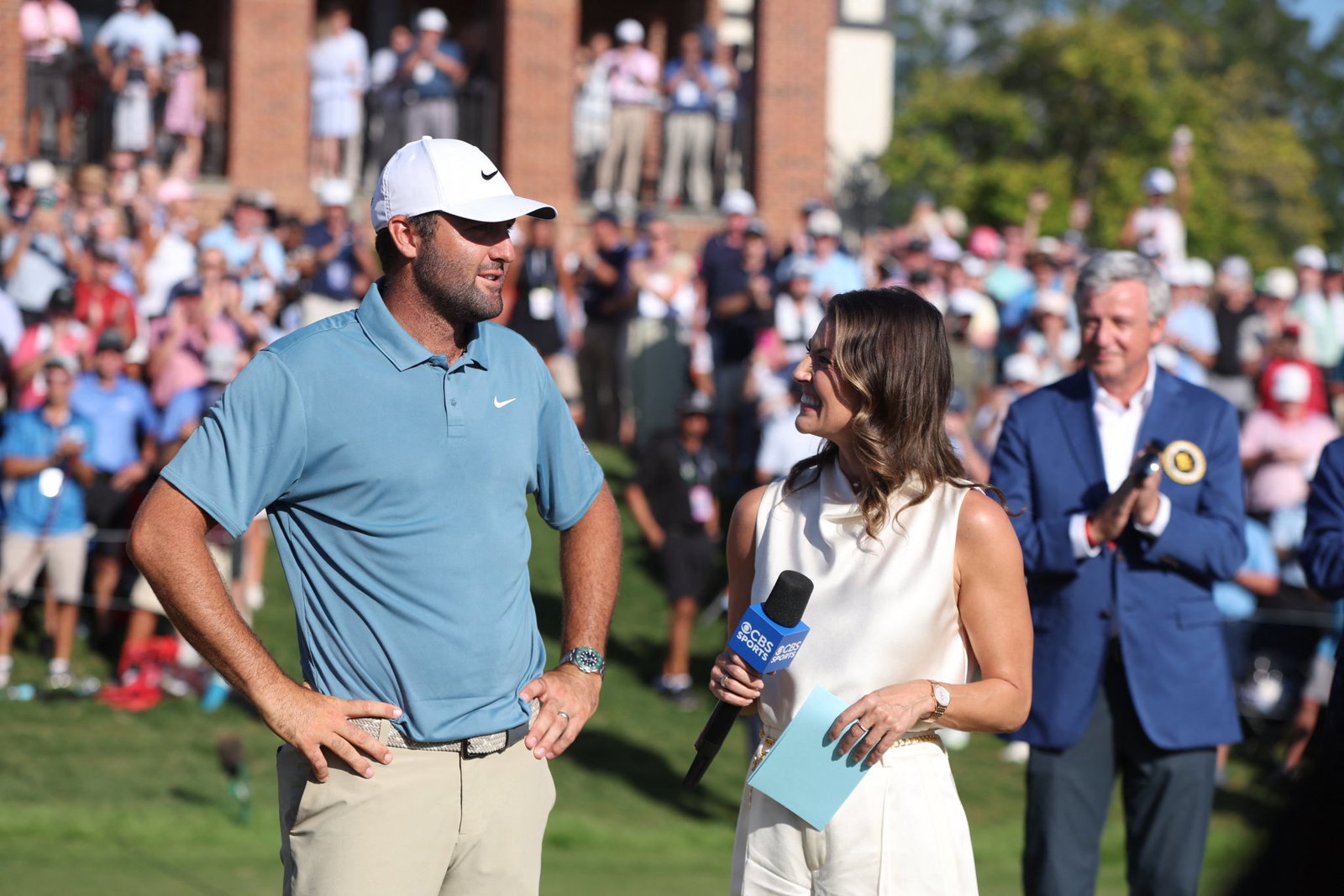 Scottie Scheffler with CBS' Amanda Balionis