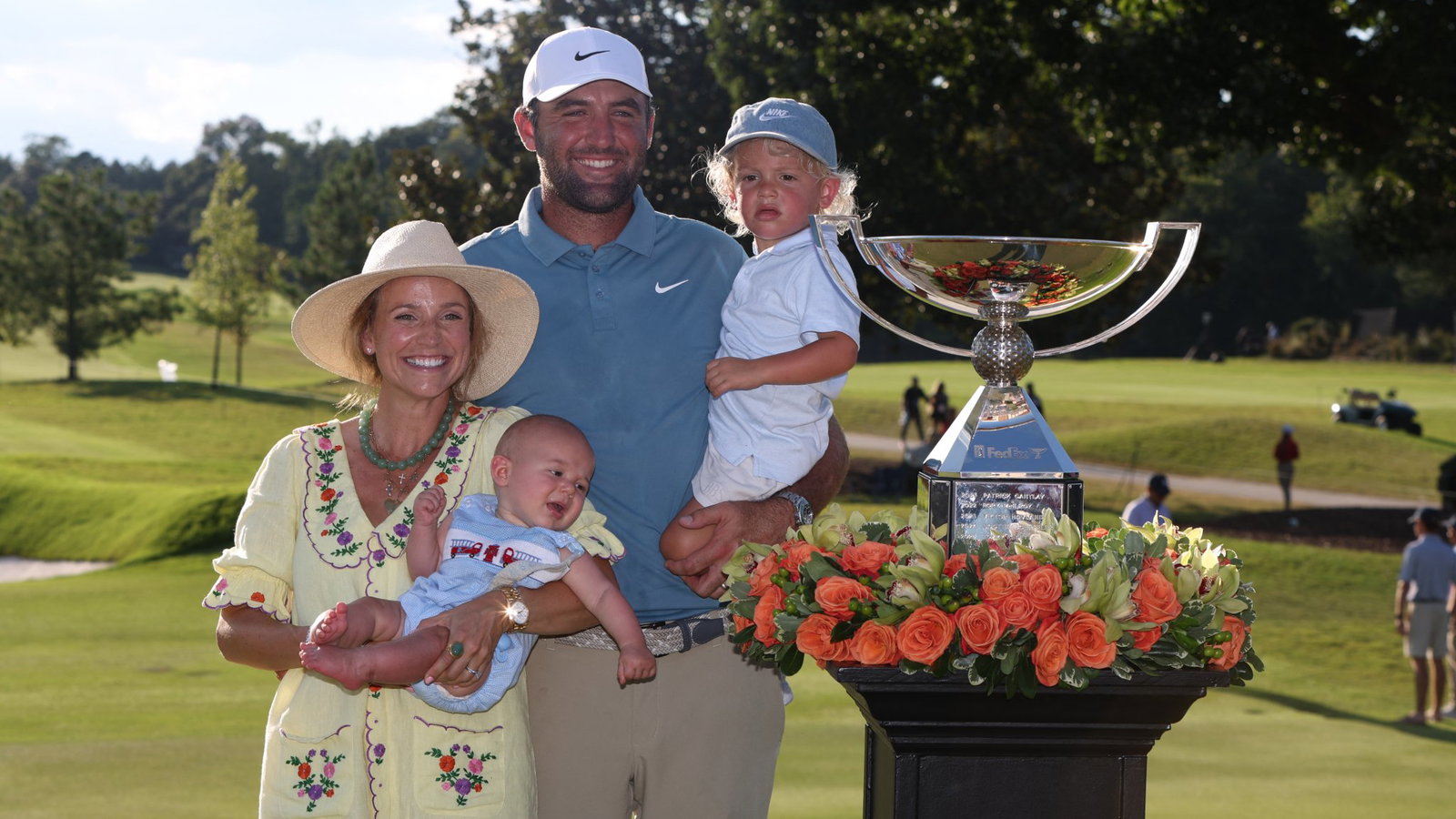 Scottie Scheffler celebrates with family