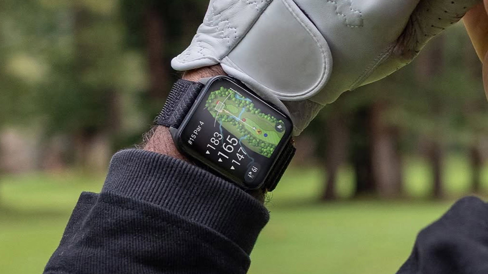The Garmin Venu X1 watch being used for golf.