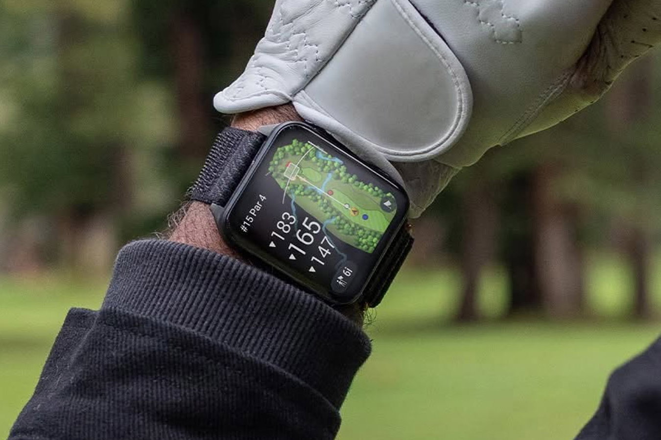 The Garmin Venu X1 watch being used for golf.