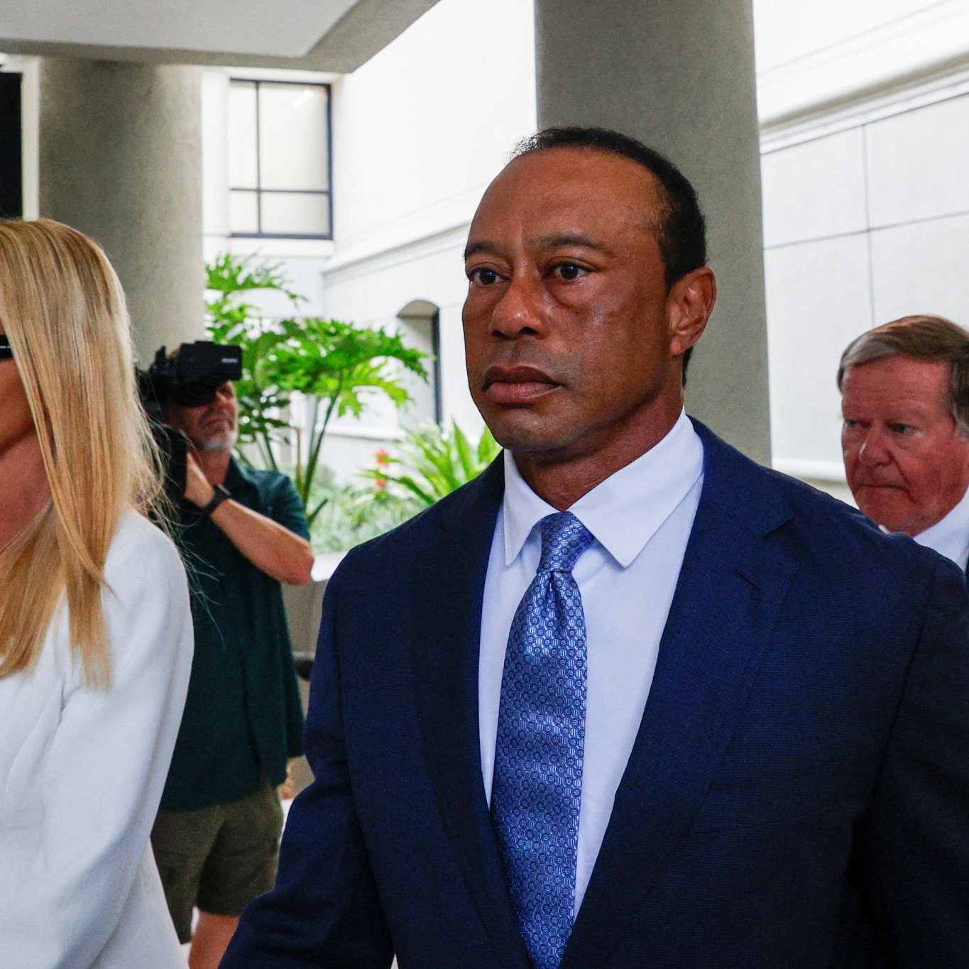 Woods with girlfriend Vanessa Trump on Wednesday