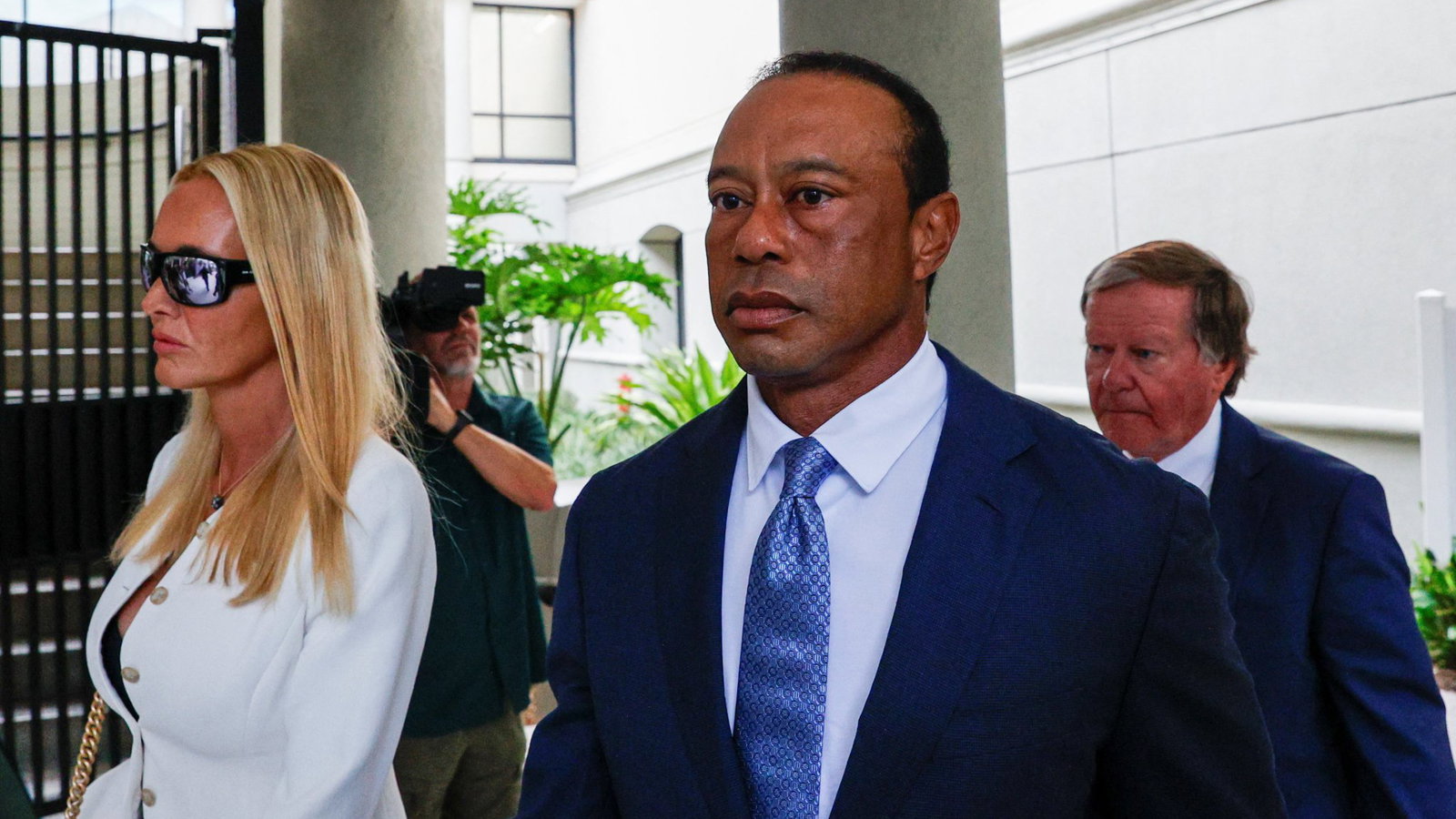 Woods with girlfriend Vanessa Trump on Wednesday