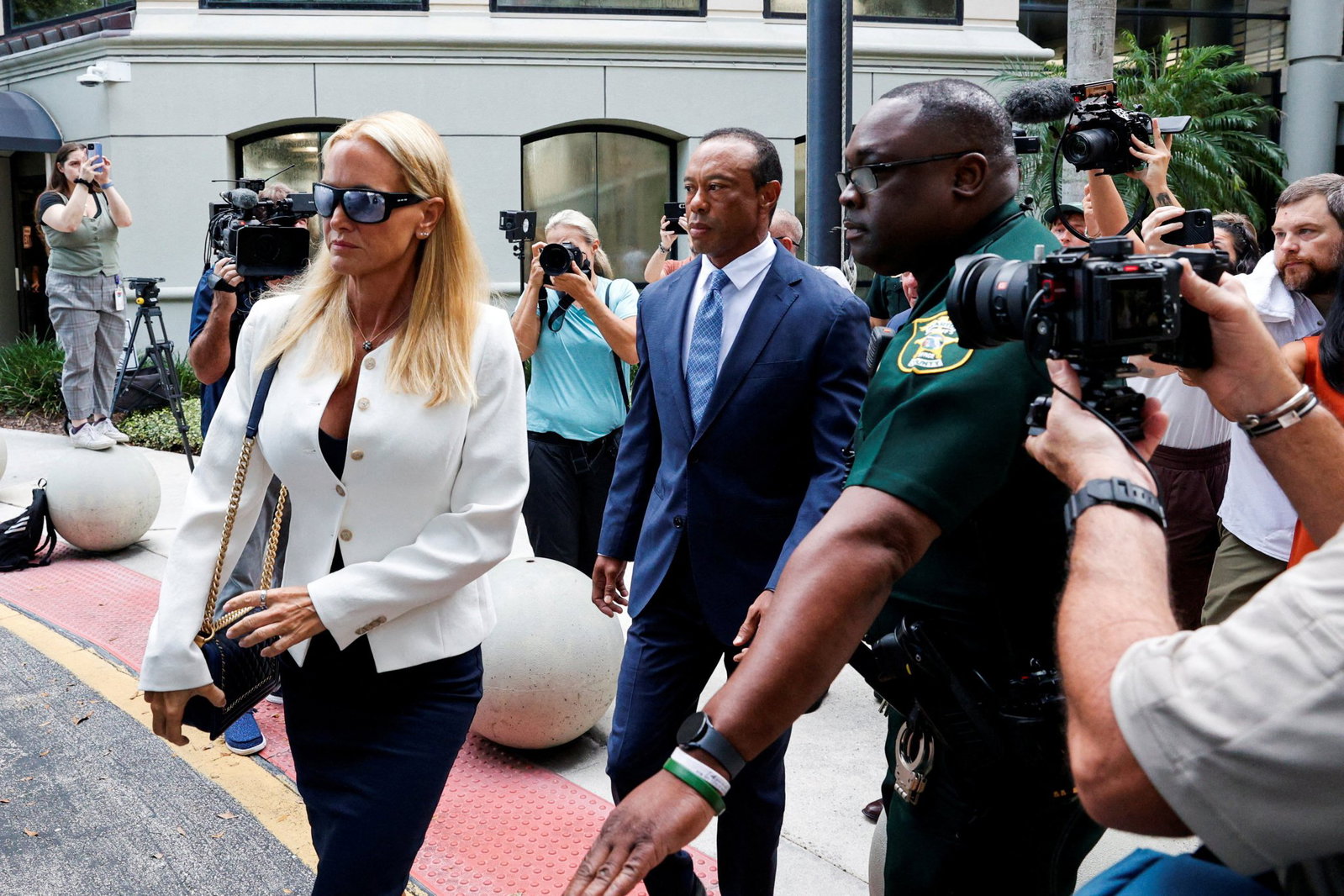 Tiger Woods with Vanessa Trump at court hearing