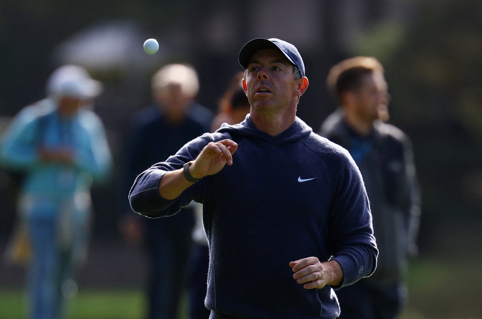 McIlroy appears to be warming more to Reed