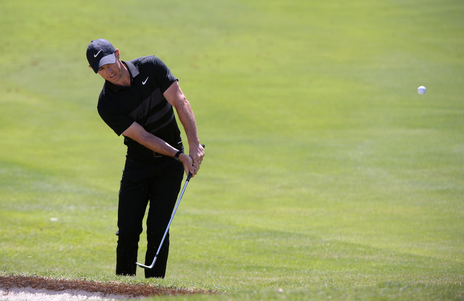 Rory McIlroy fluffs a chip during TaylorMade Driving Relief