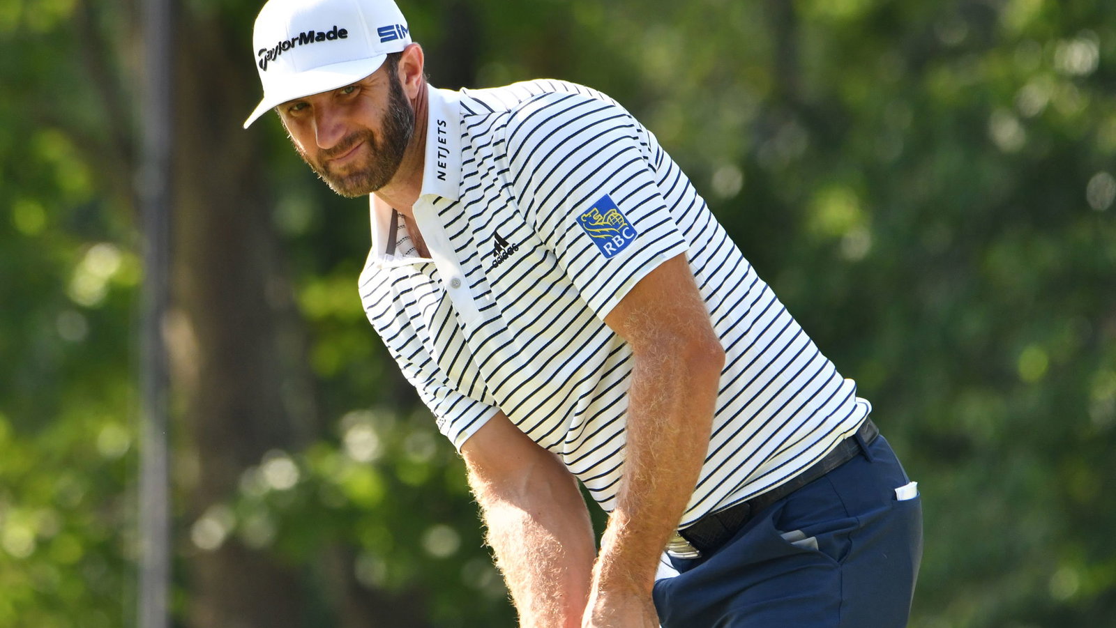 Dustin Johnson shoots 60 to take lead at The Northern Trust