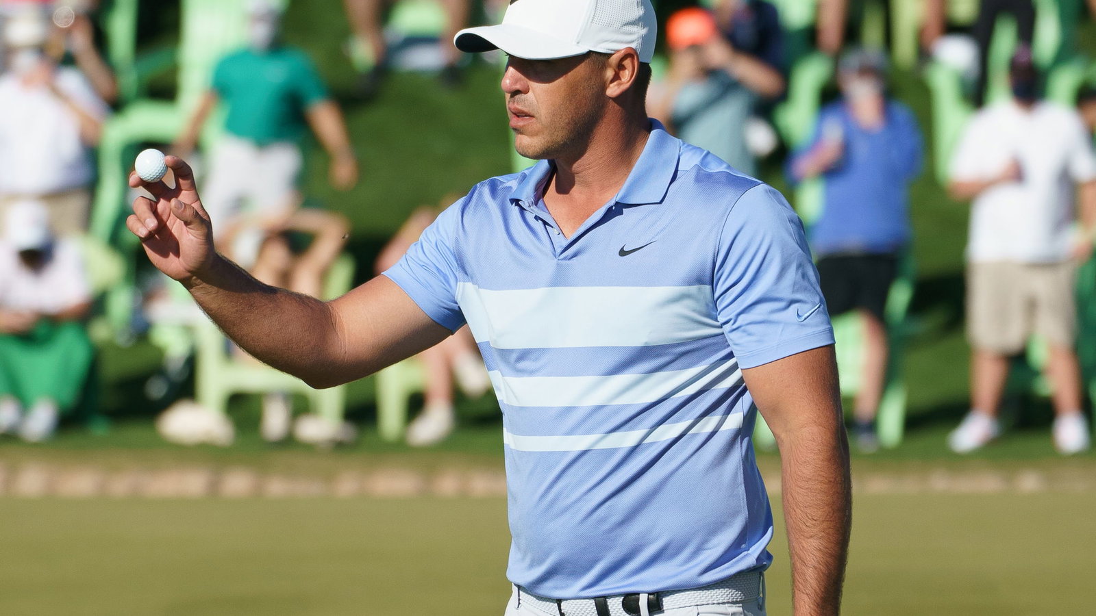 Brooks Koepka hits LEFT-HANDED wedges in prep for charity match