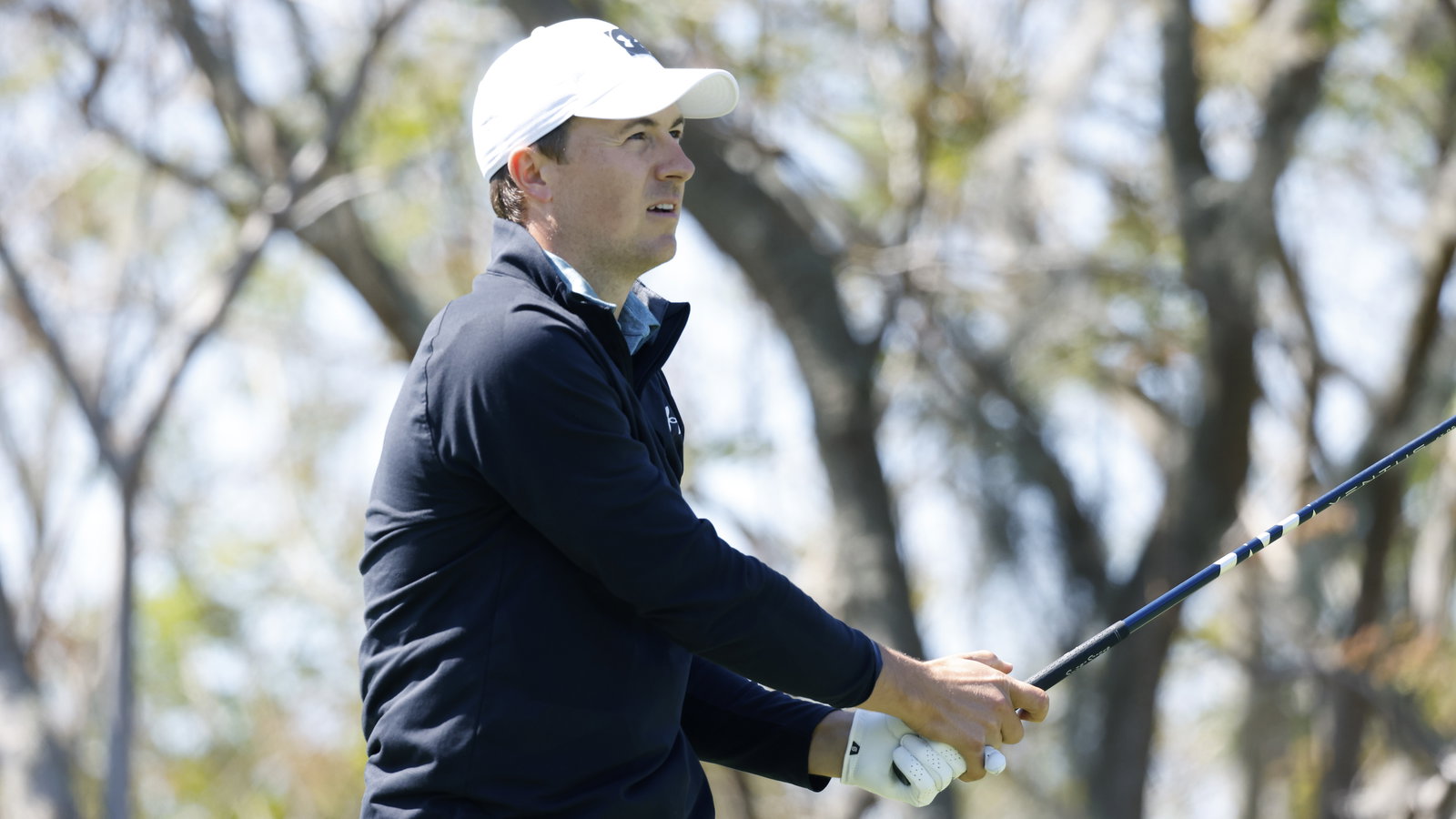 Young golf fan stops Jordan Spieth to read him his school report